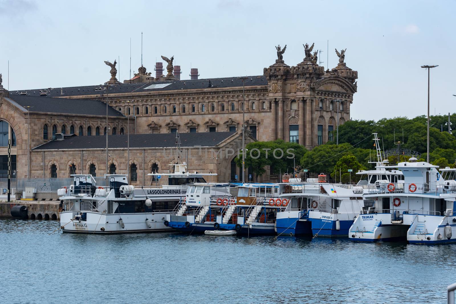 Barcelona, Spain - July 28 2020:  Reial Club Marítim Barcelona Port through empty streets after COVID 19 in Barcelona, Spain.