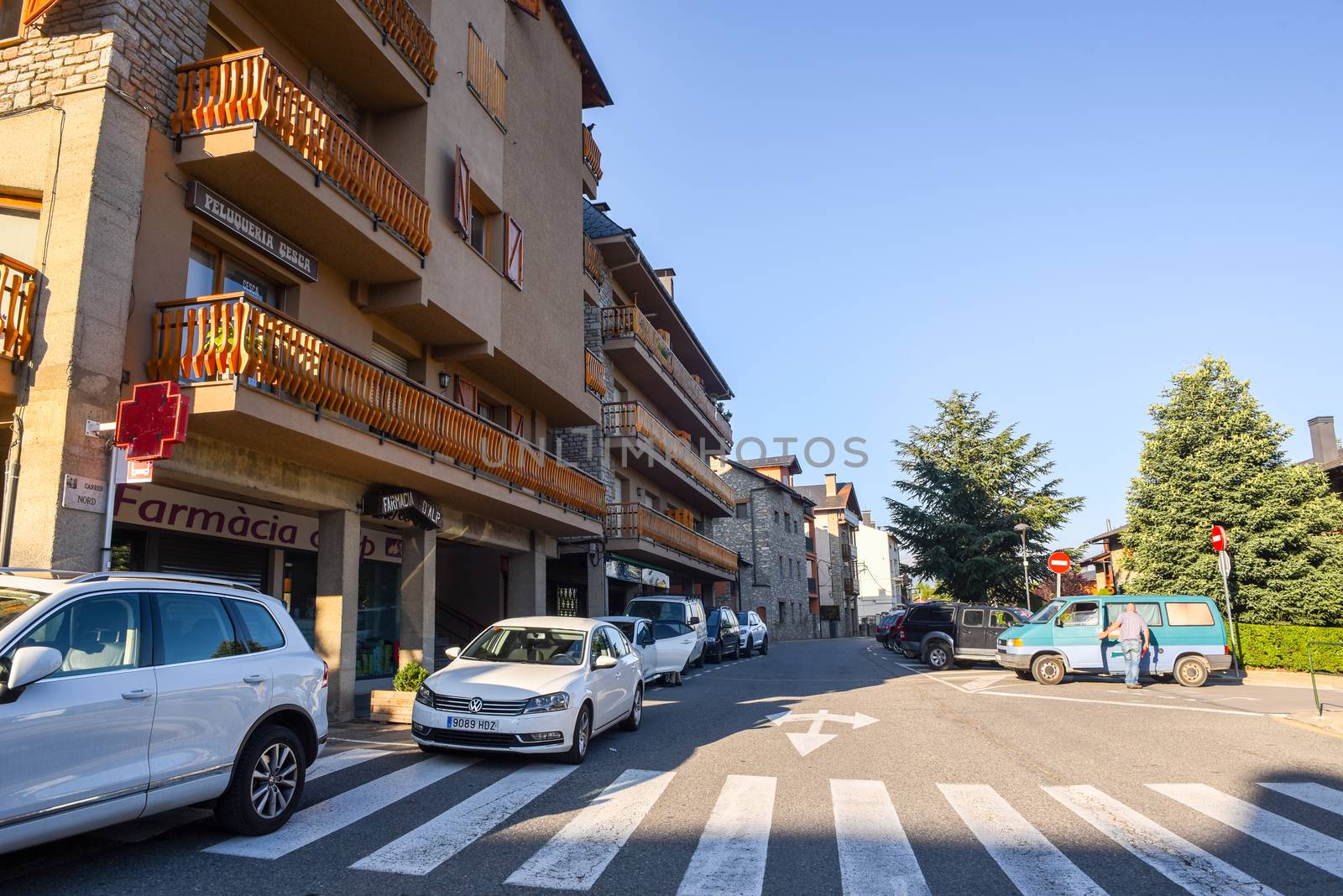 Main street behind the Church of Parròquia de Sant Pere in Summ by martinscphoto