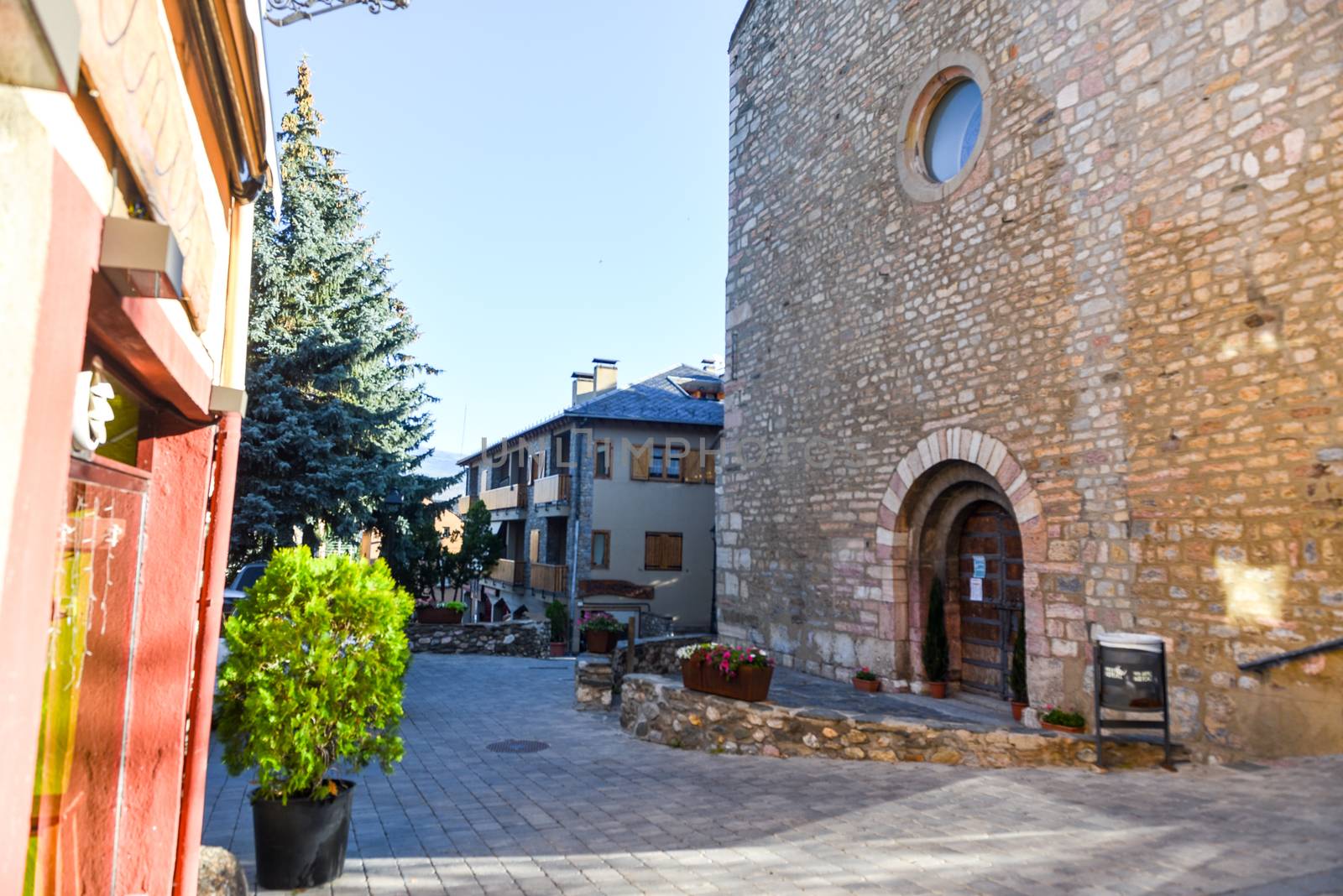 Alp, Spain : 2020 19 July : Major Street behind the Church of Parròquia de Sant Pere in Summer. Alp, Spain  on July 2020.