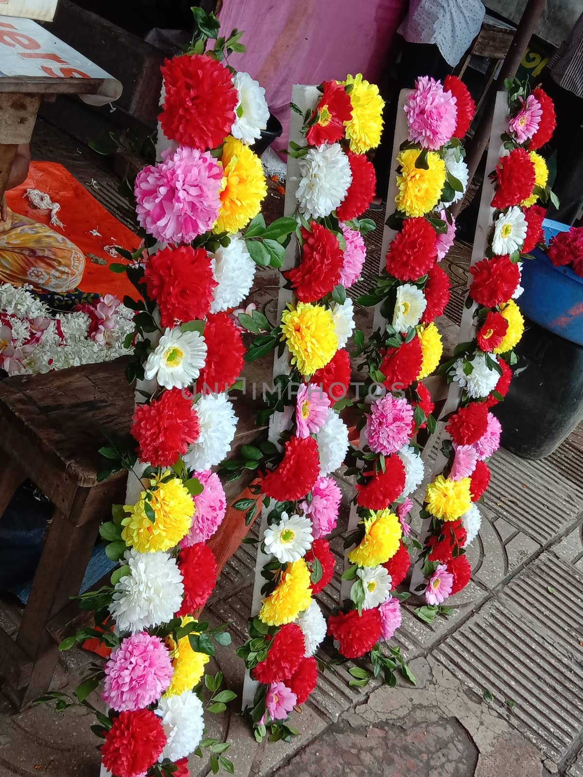 multiple colored flower bouquet closeup in shop for sell