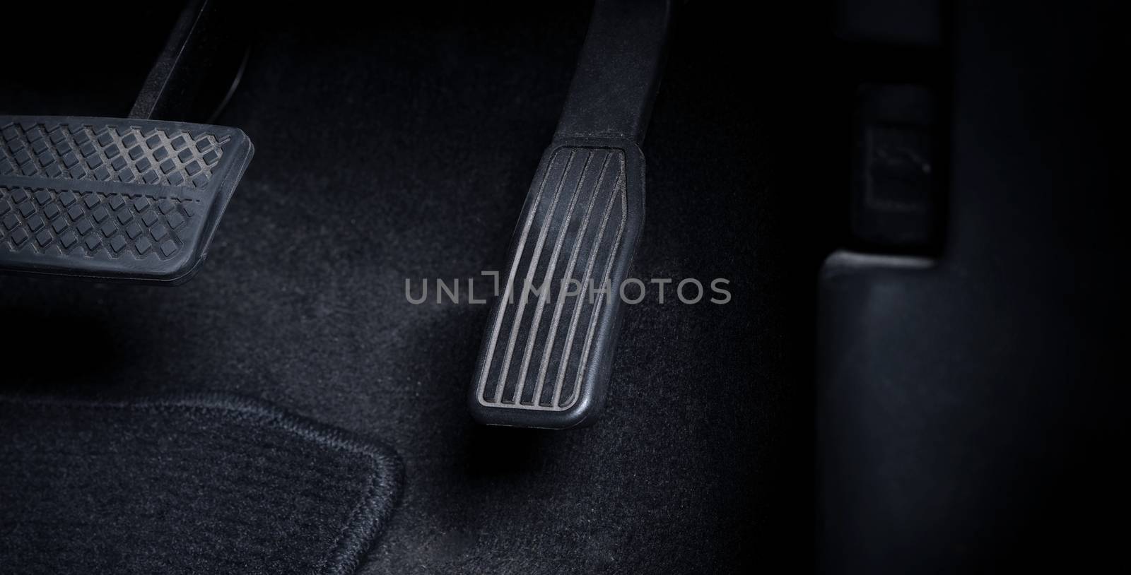 Close up images of man driving car by pushing accelerator and br by gnepphoto