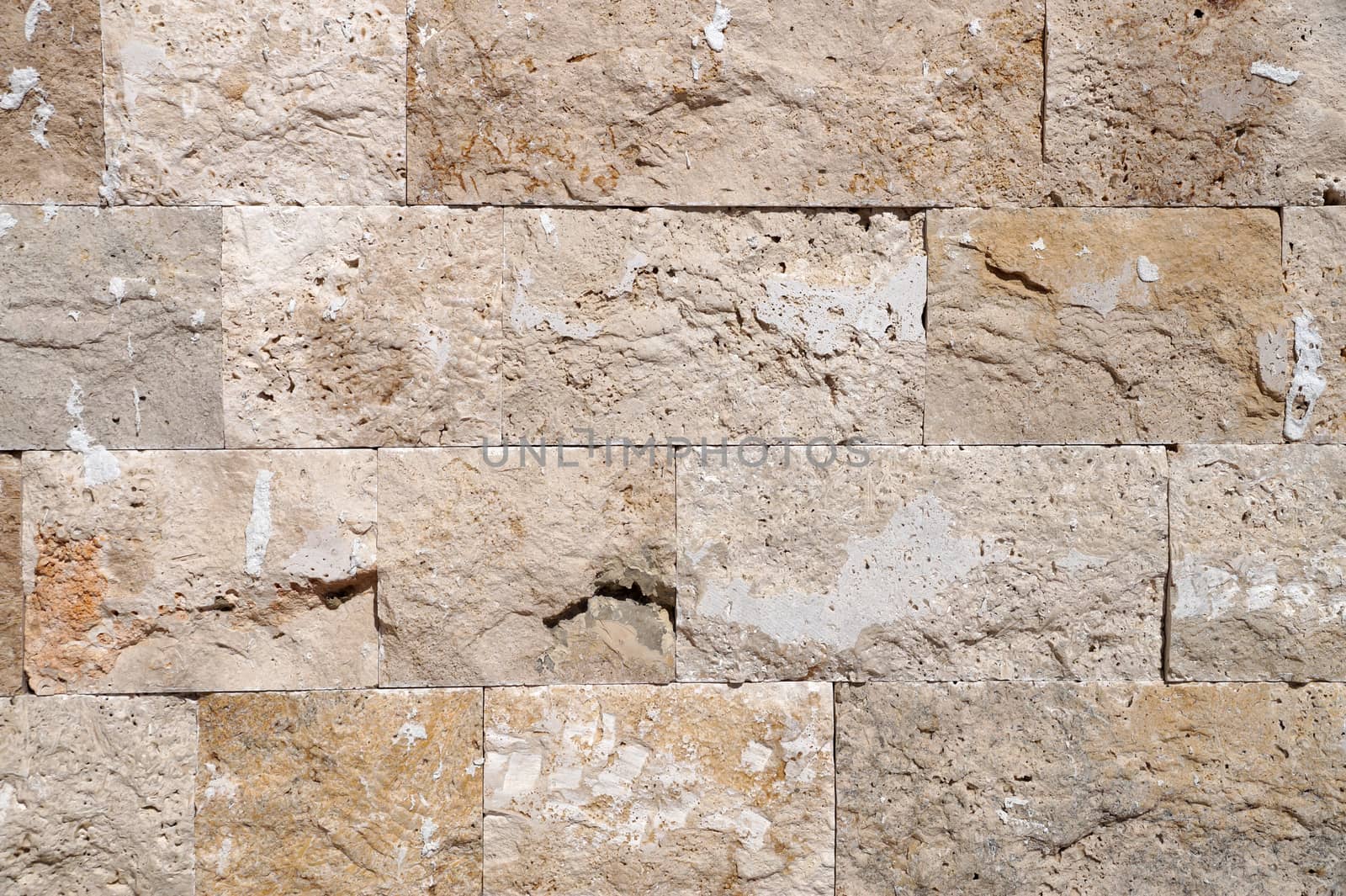 beige natural stone wall for background