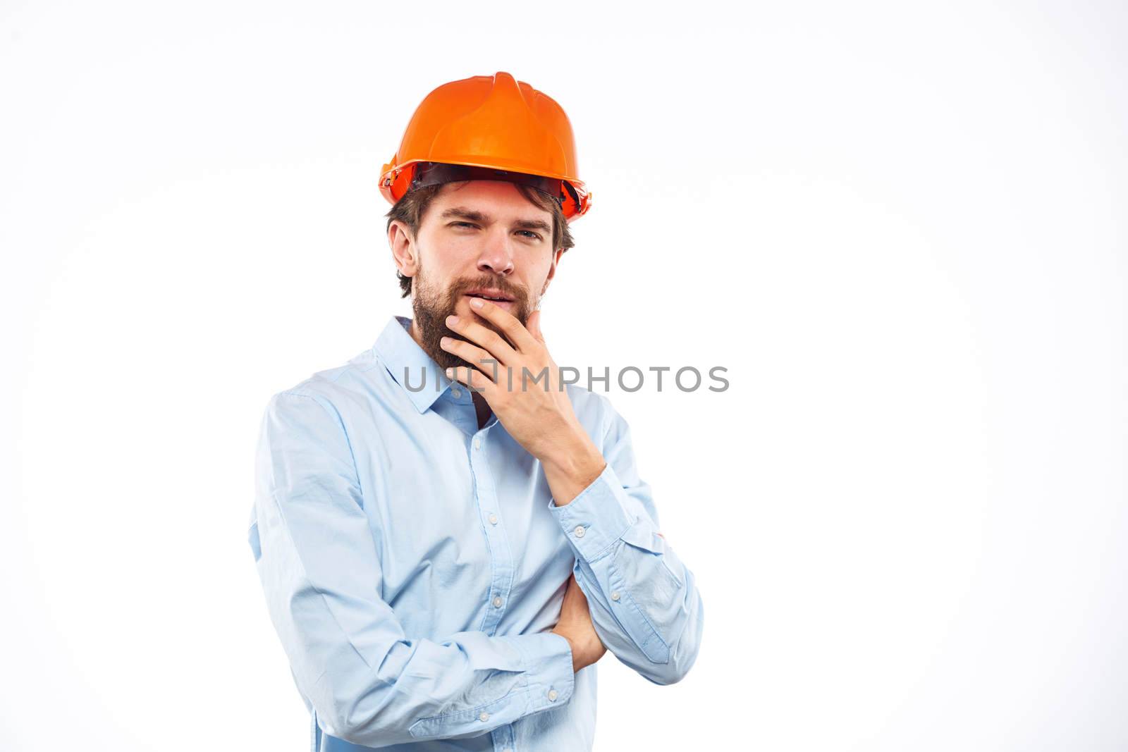 Emotional man in orange paint construction industry work lifestyle. High quality photo