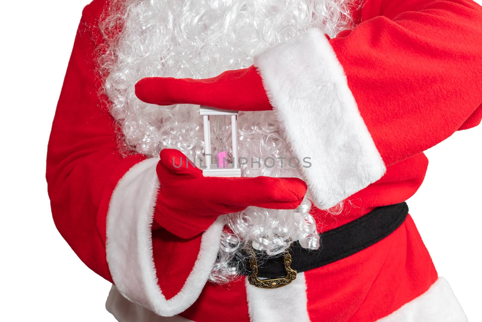 Santa Claus holding a white sand clock with both hands. Time is out. New year's eve concept. Isolated on white background.