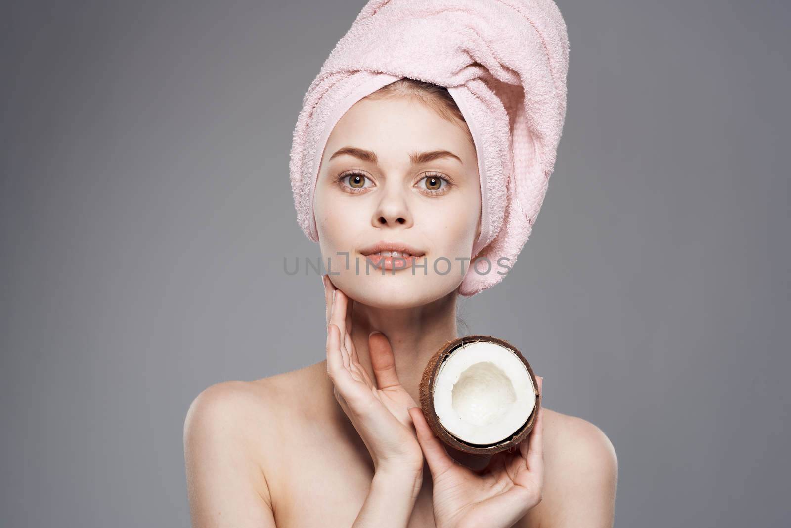 Pretty woman spa treatments exotic clean skin gray background by SHOTPRIME