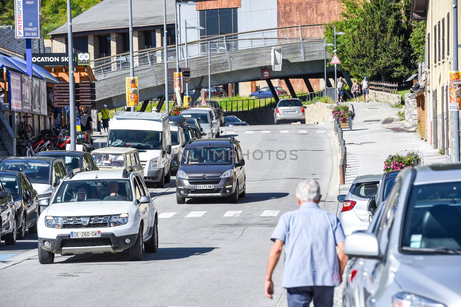 Les Angles, France : 2020 July 19 : People walk in summer on Les Angles ski resort city in Sunny day.  les Angles, France.