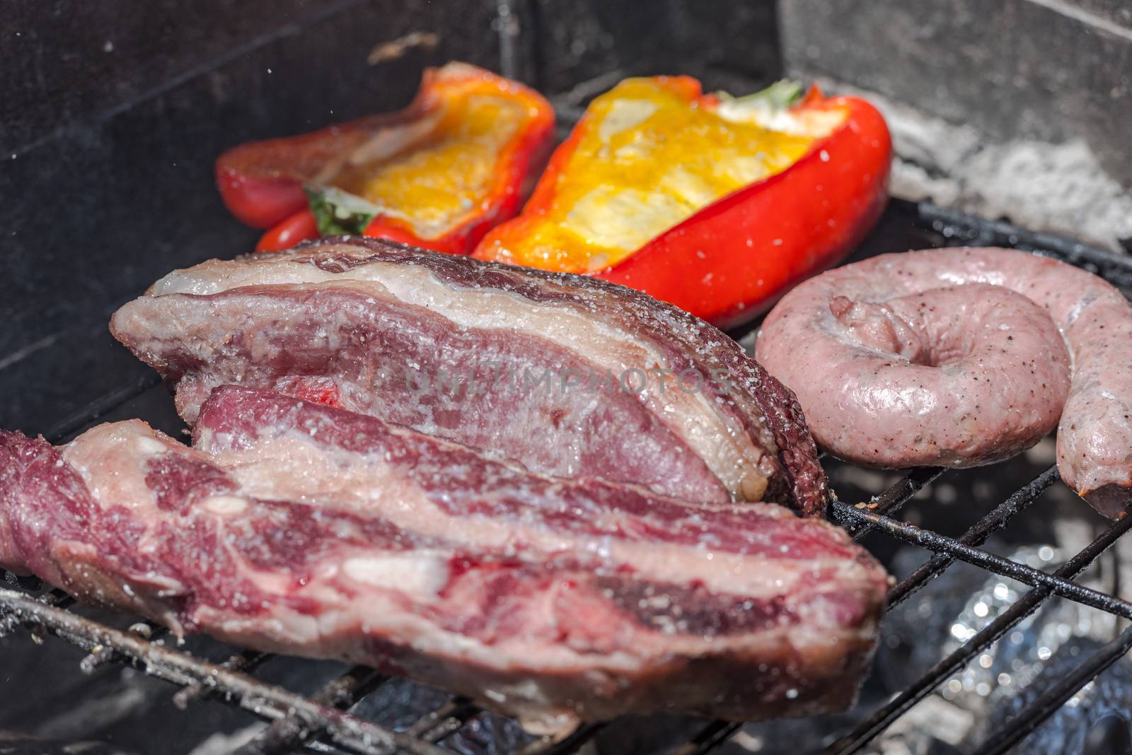 Closeup take of a traditional Argentinian and Uruguayan barbecue by martinscphoto