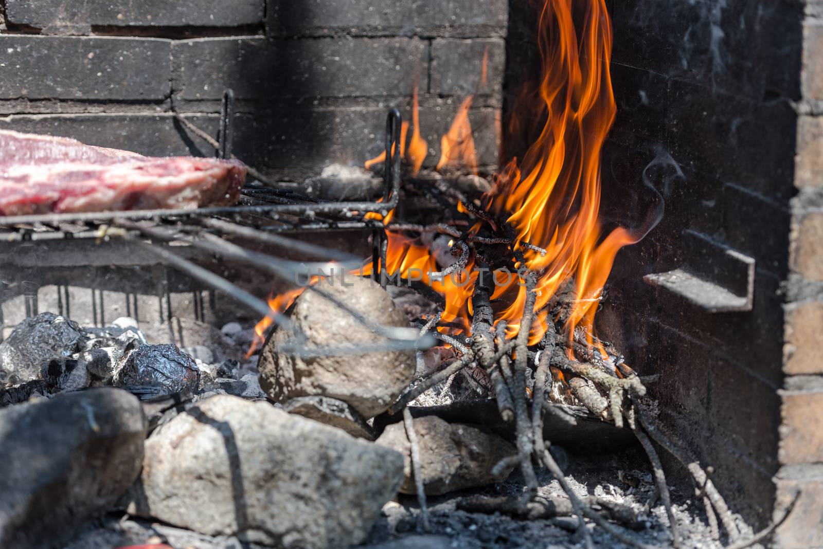 Closeup take of a traditional Argentinian and Uruguayan barbecue by martinscphoto