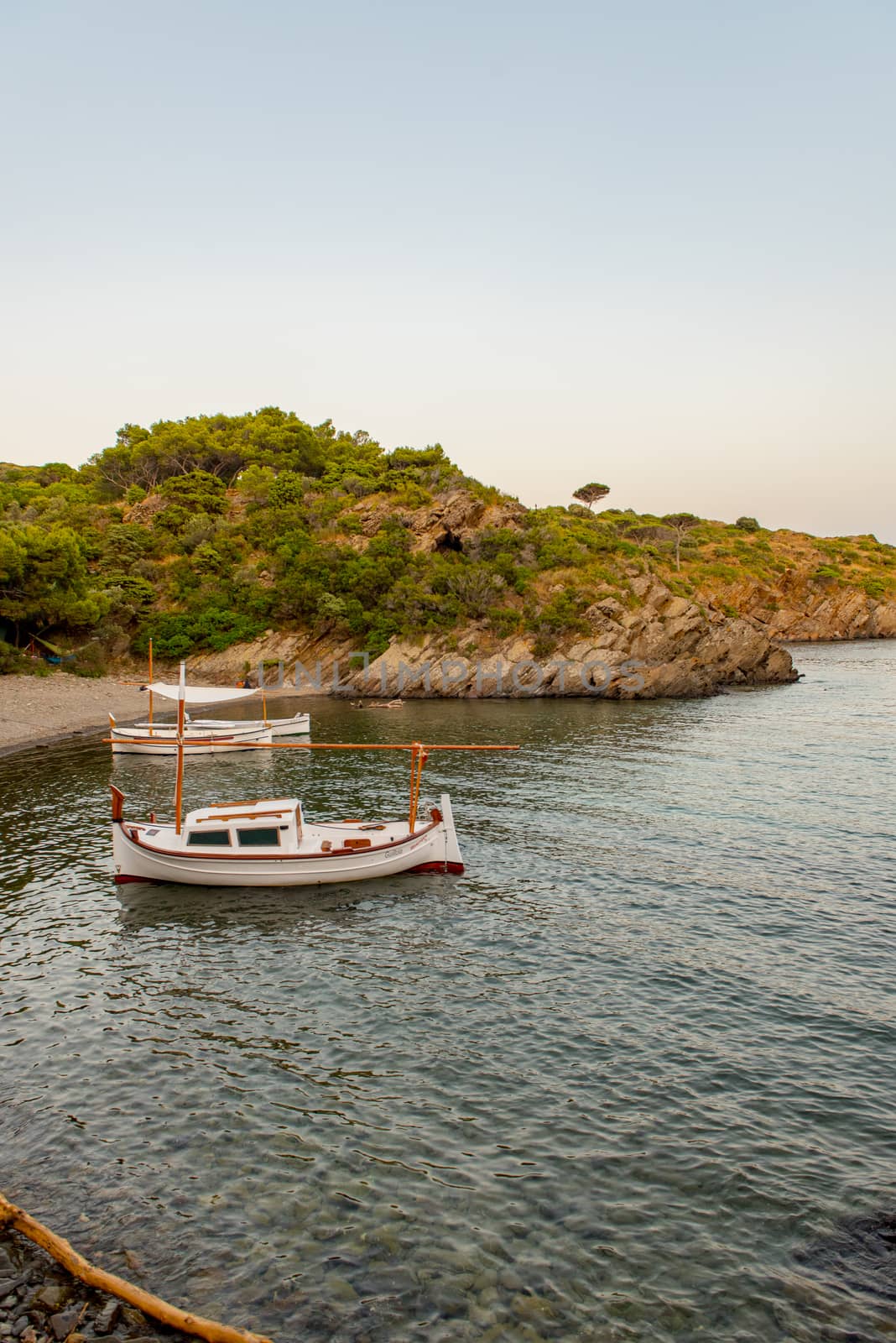 Spain Costa Brava peaceful pebble beach of the Mediterranean sea by martinscphoto