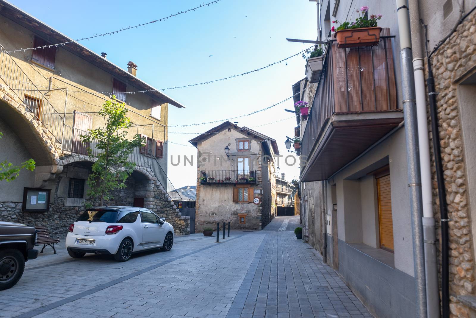 Alp, Spain : 2020 19 July : Major Street behind the Church of Parròquia de Sant Pere in Summer. Alp, Spain  on July 2020.
