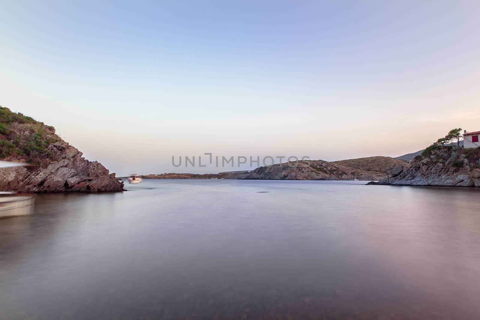 Spain Costa Brava peaceful pebble beach of the Mediterranean sea by martinscphoto