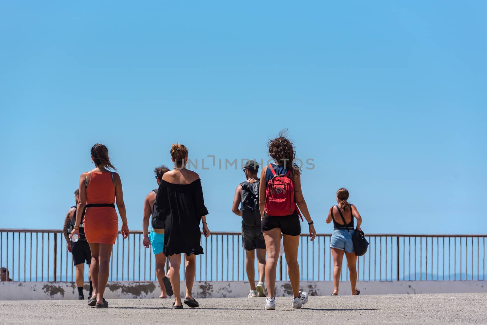 Parc Natural Cap de Creus, Spain :  8 july 2020 : People in Cap de Creus, natural park. Eastern point of Spain, Girona province, Catalonia. Famous tourist destination in Costa Brava. Sunny summer day with blue sky and clouds