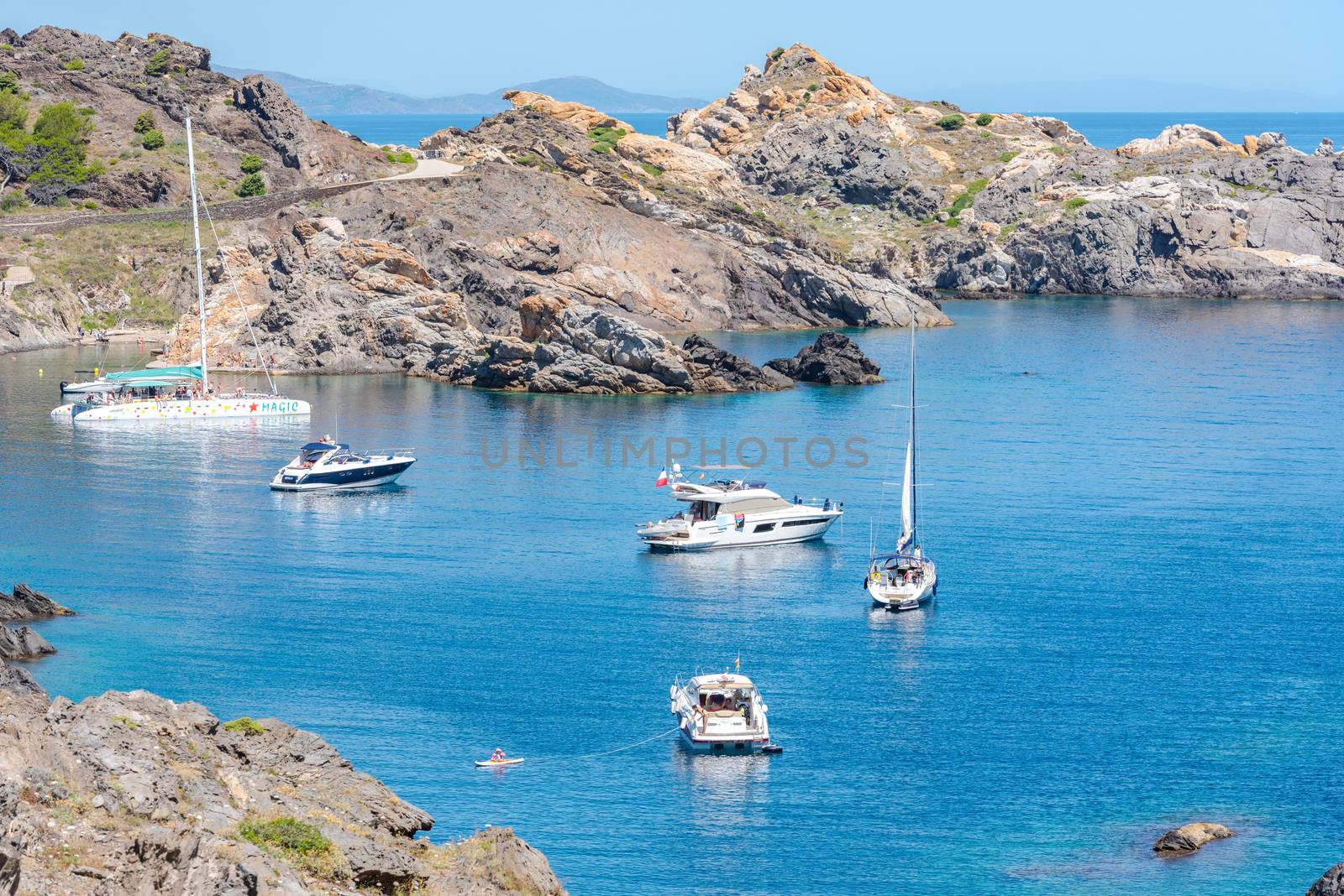 Parc Natural Cap de Creus, Spain :  8 july 2020 : Sea landscape with Cap de Creus, natural park. Eastern point of Spain, Girona province, Catalonia. Famous tourist destination in Costa Brava. Sunny summer day with blue sky and clouds