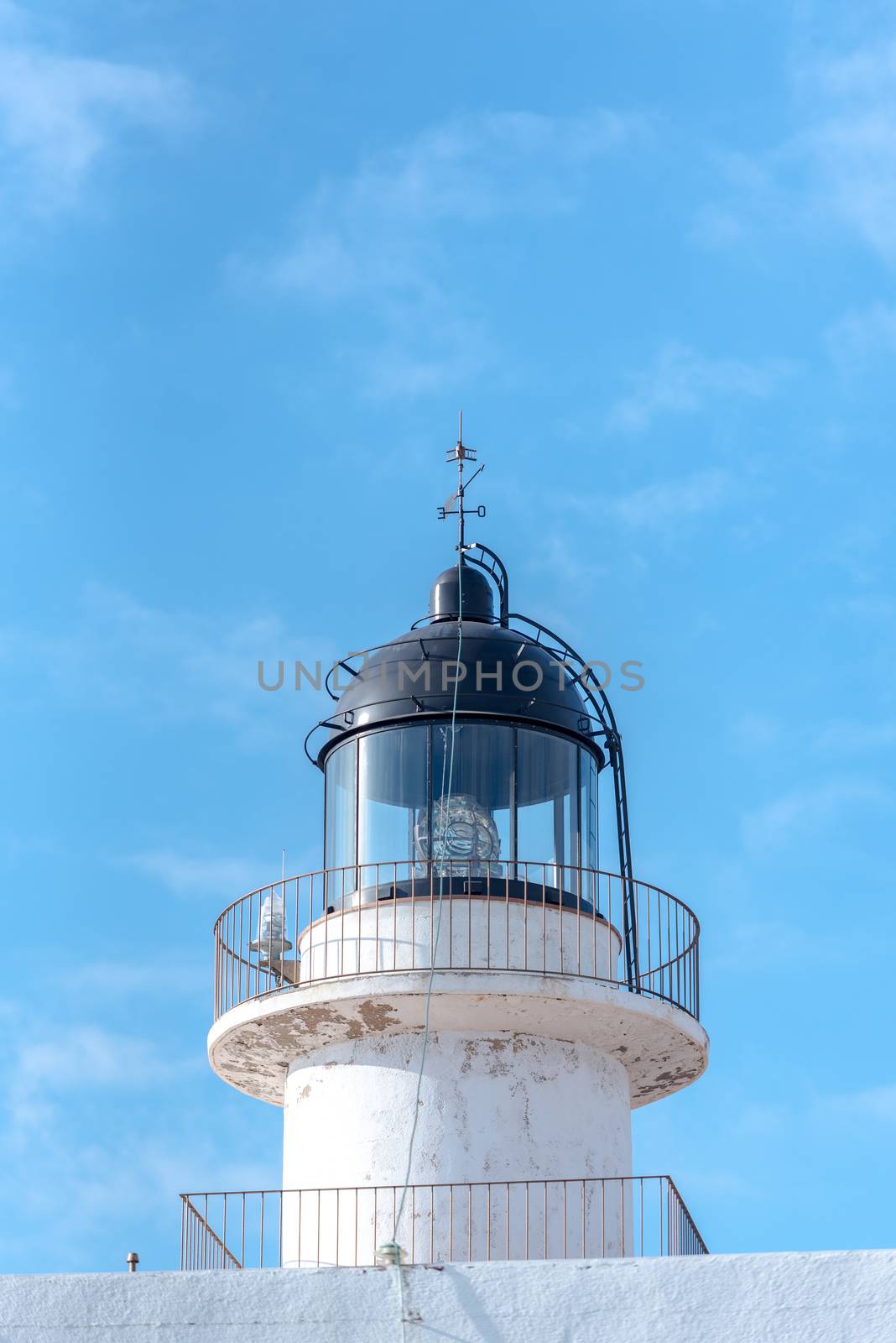 Parc Natural Cap de Creus, Spain :  8 july 2020 : Cap de Creus, natural park. Eastern point of Spain, Girona province, Catalonia. Lighthouse in  tourist destination in Costa Brava. Sunny summer day with blue sky and clouds