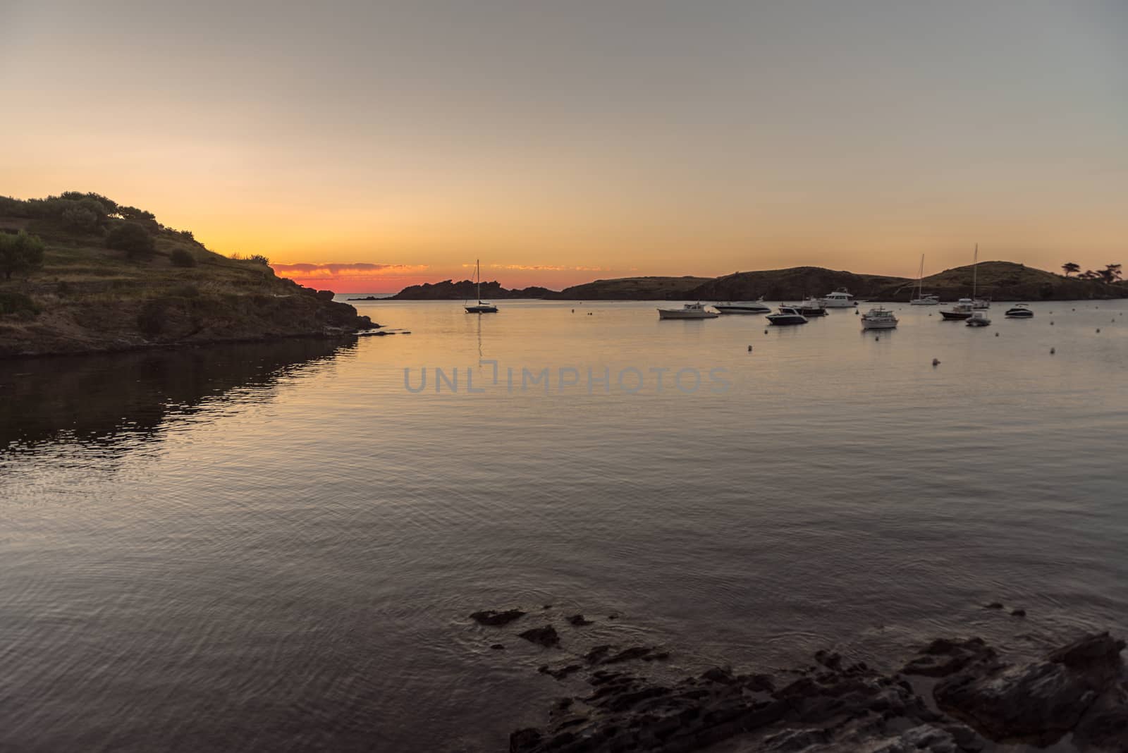 Sunset in Port Lligat in Cala Salvador Dali, painter, sculptor,  by martinscphoto