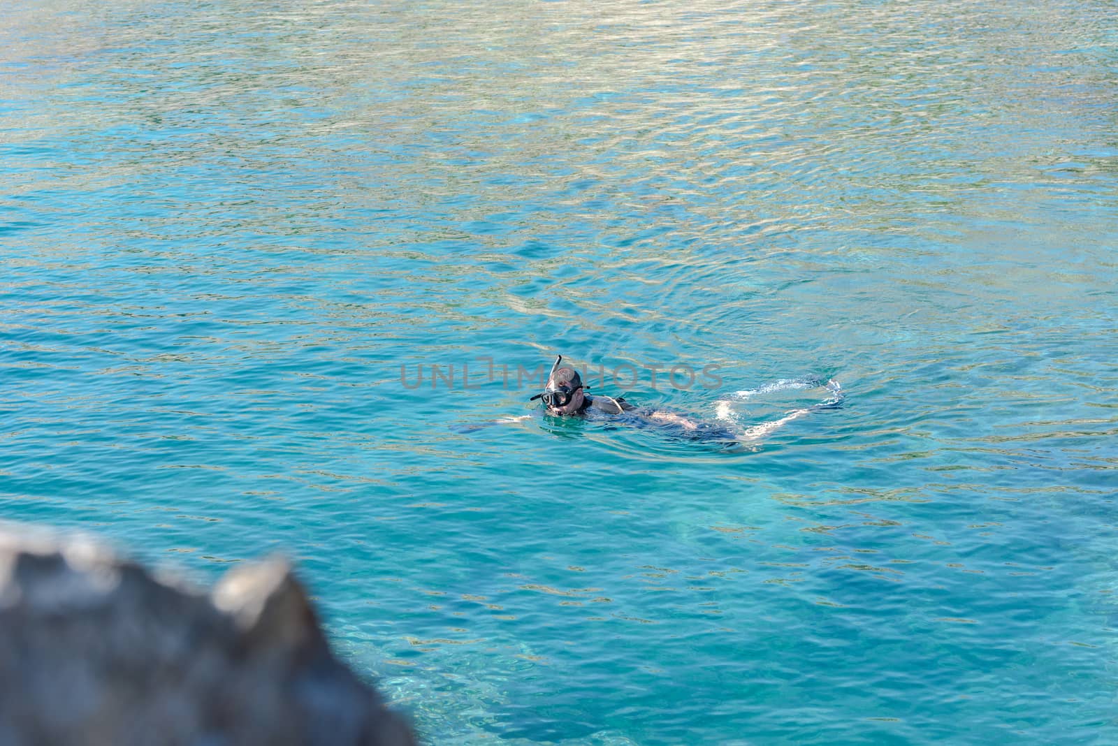 Parc Natural Cap de Creus, Spain :  8 july 2020 : Man make snorkel in  Cap de Creus, natural park. Eastern point of Spain, Girona province, Catalonia. Famous tourist destination in Costa Brava. Sunny summer day with blue sky and clouds