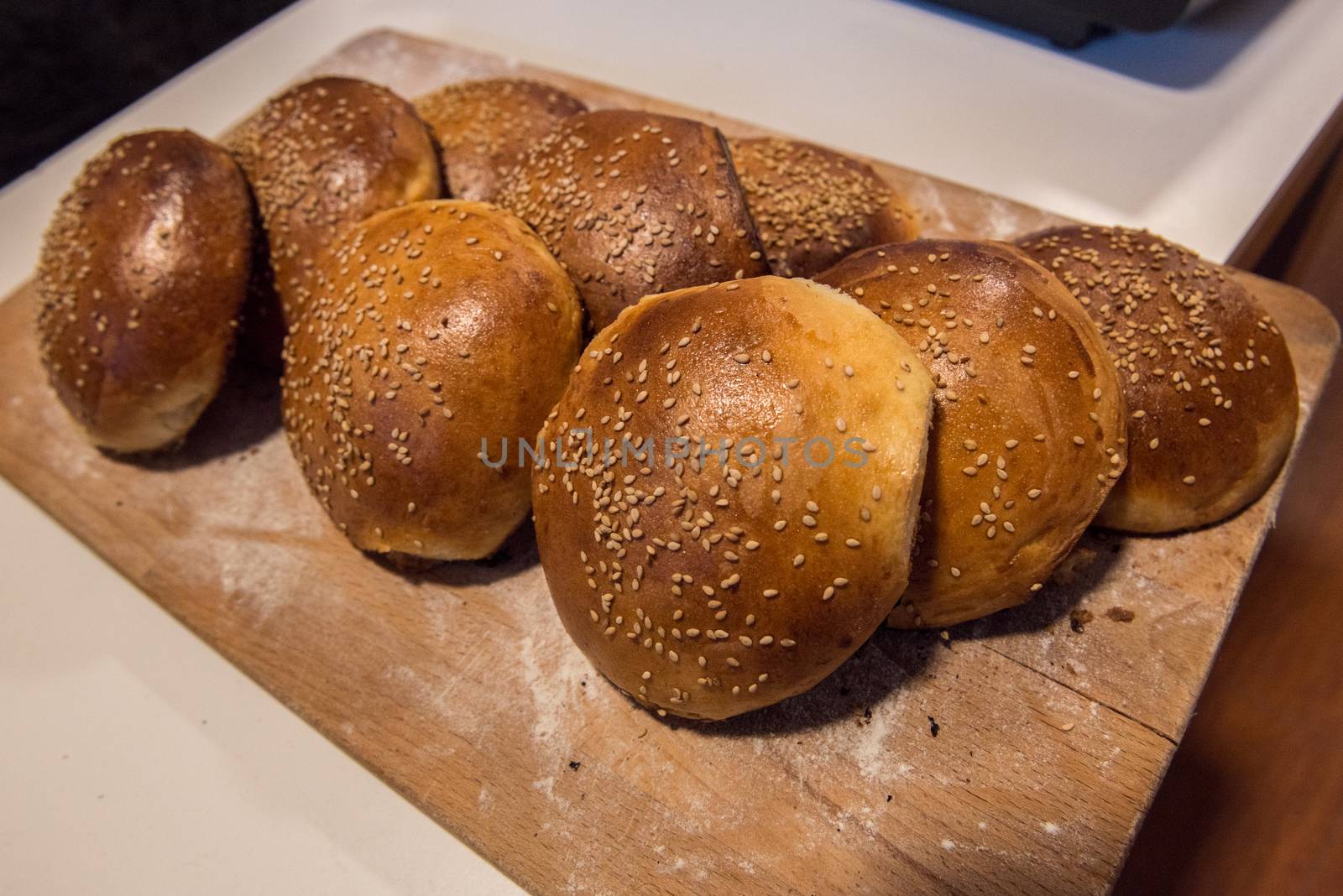 Homemade bread on table with light white flour.