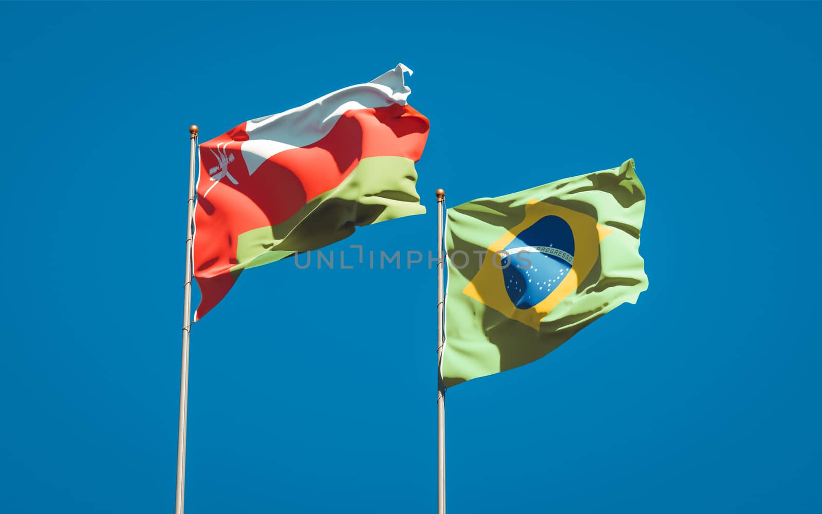 Beautiful national state flags of Oman and Brasil together at the sky background. 3D artwork concept. 