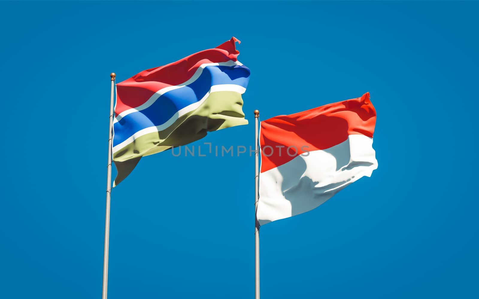 Beautiful national state flags of Gambia and Indonesia together at the sky background. 3D artwork concept. 