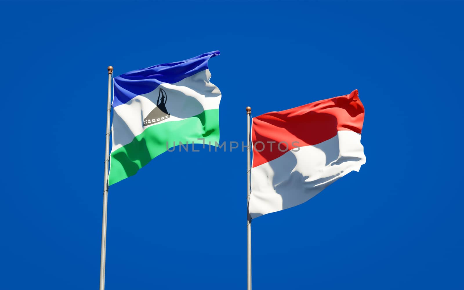 Beautiful national state flags of Lesotho and Indonesia together at the sky background. 3D artwork concept. 