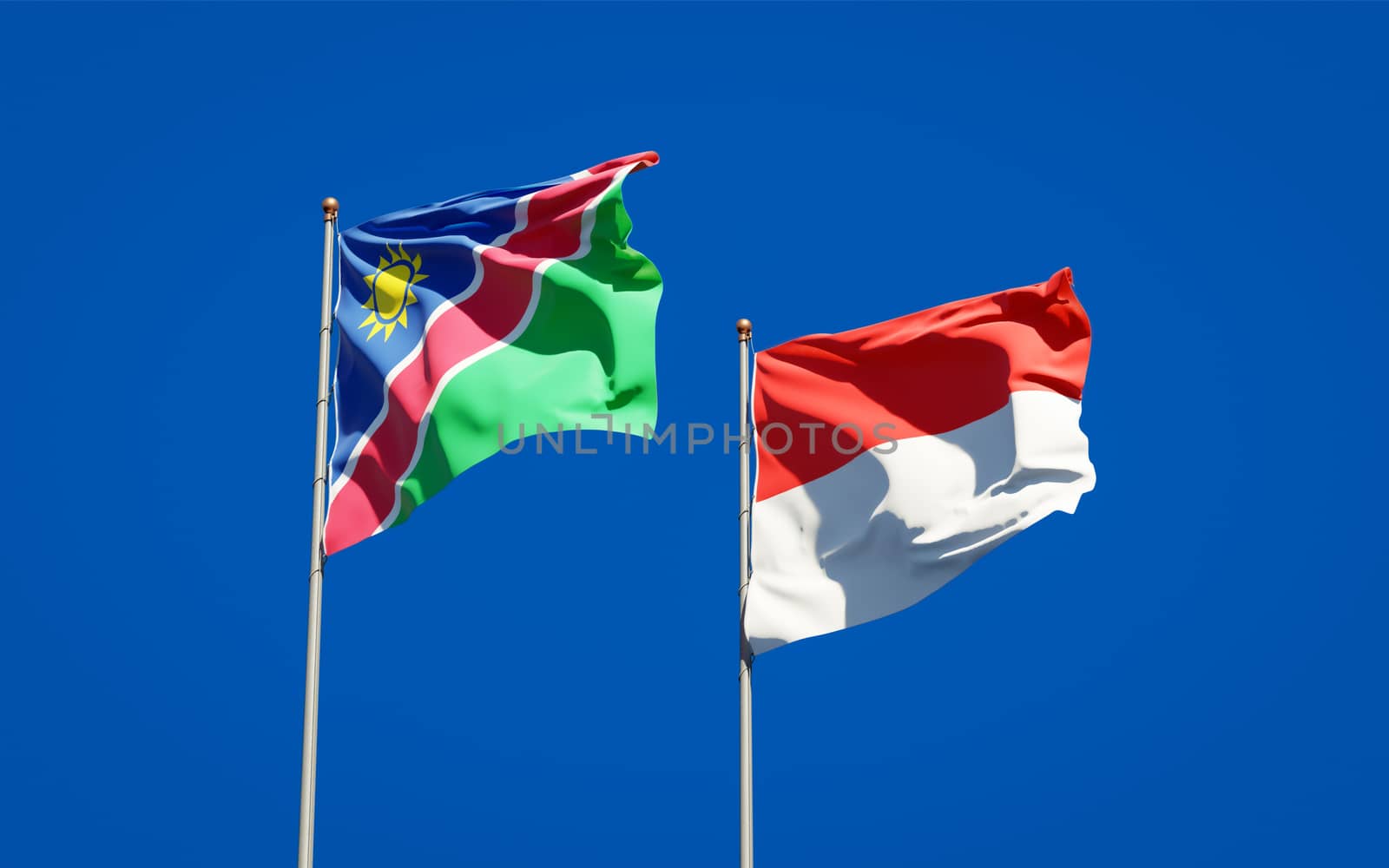 Beautiful national state flags of Namibia and Indonesia together at the sky background. 3D artwork concept. 
