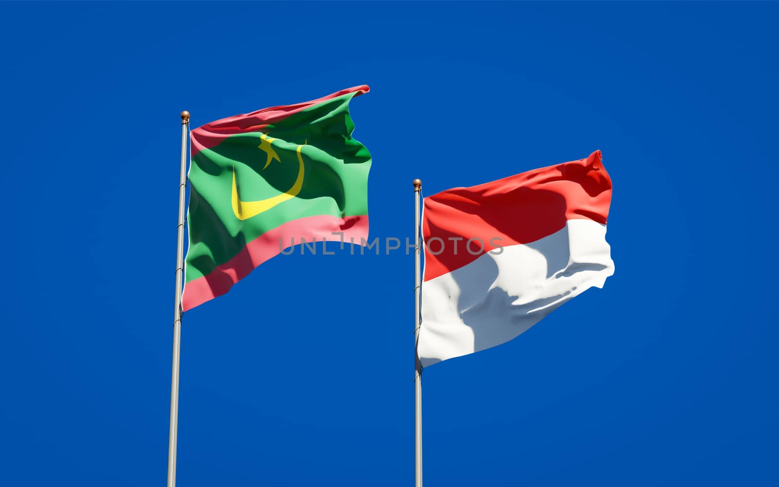 Beautiful national state flags of Mauritania and Indonesia together at the sky background. 3D artwork concept. 