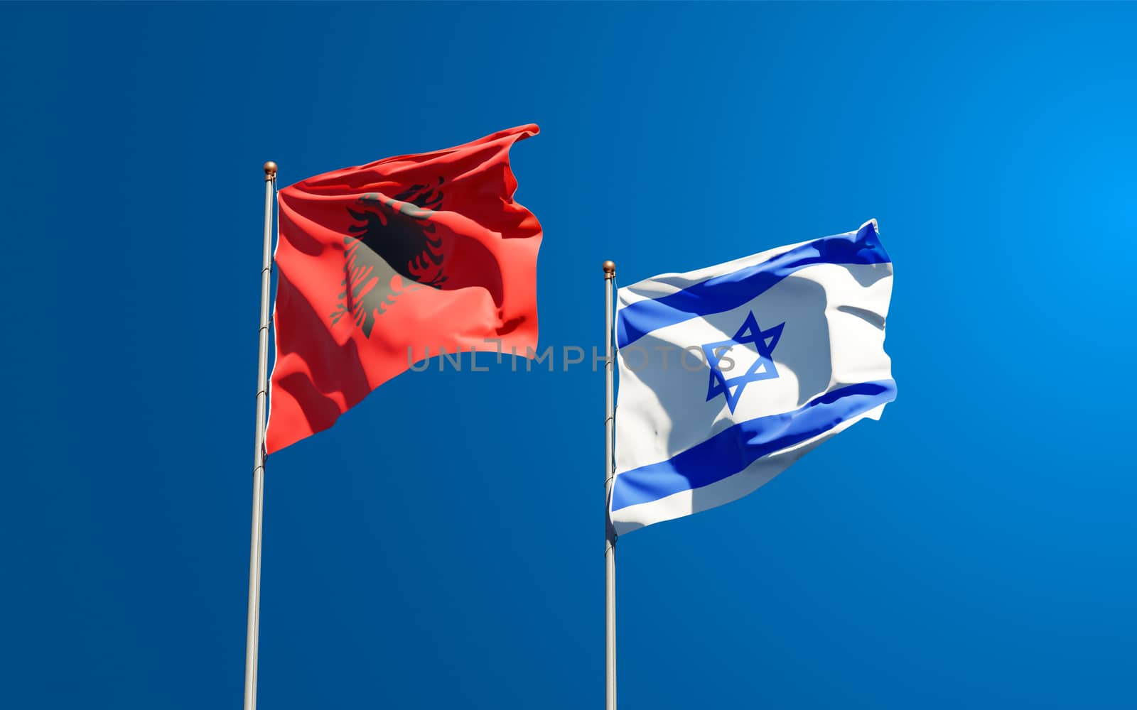 Beautiful national state flags of Israel and Albania together at the sky background. 3D artwork concept.