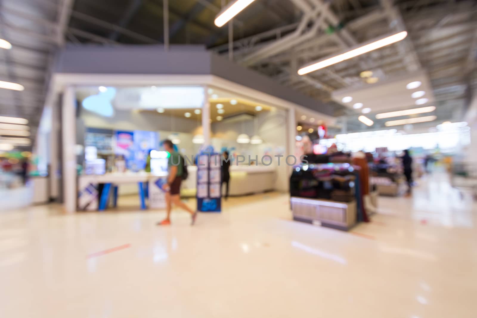 Abstract Blur image background of light bokeh in shopping mall o by thampapon