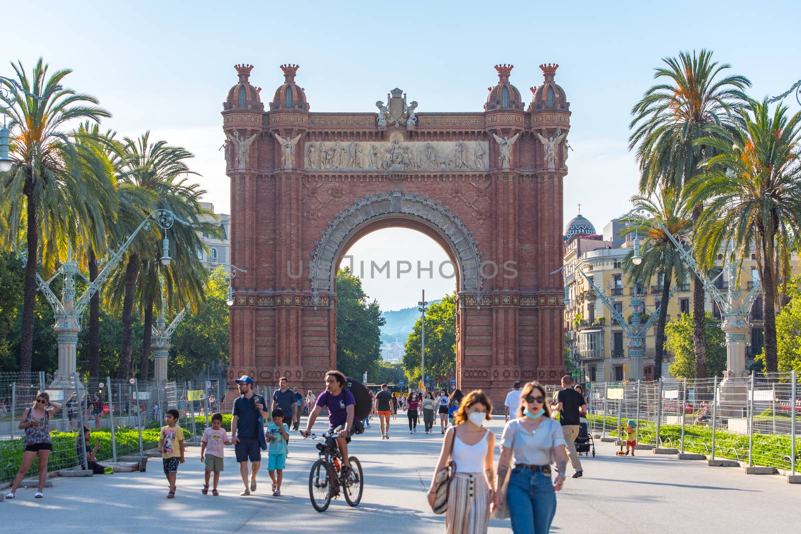 Barcelona, Spain :  June 26: People walk Arc de Triomf landmark in Ciutat Vella district on June 26, 2020 in Barcelona afer COVID 19.