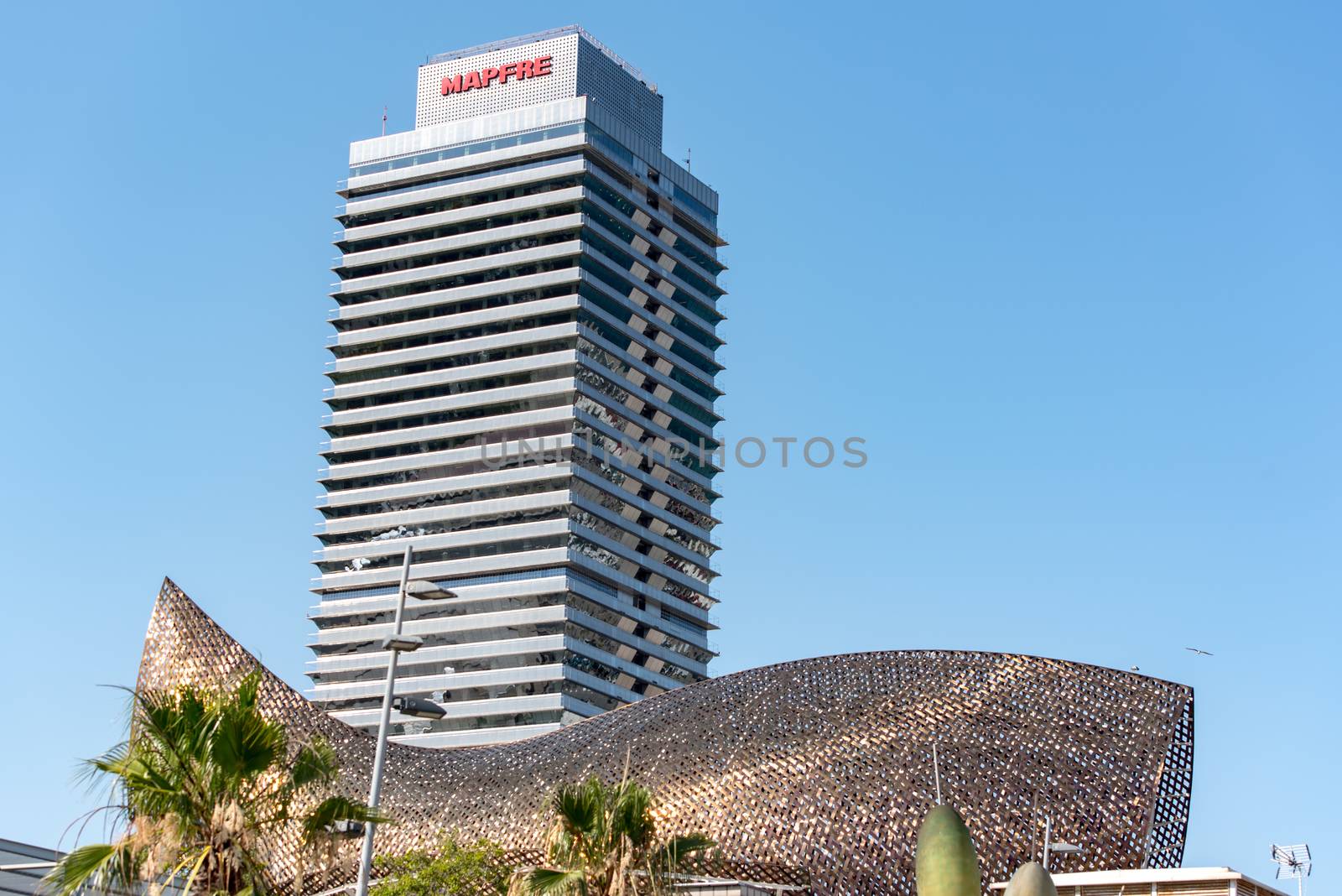 BARCELONA - JUNE 26, 2020: Barceloneta beach with people in summer after COVID 19 on June 26, 2020 in Barcelona, ​​Spain.