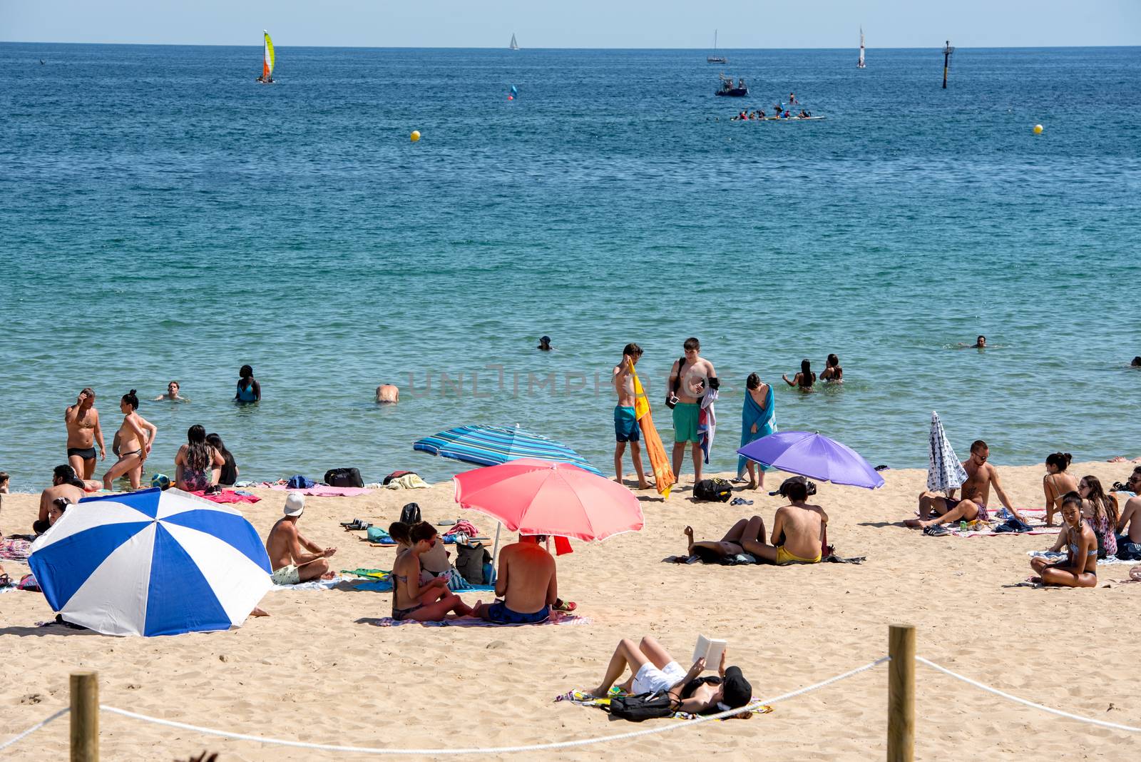 BARCELONA - JUNE 26, 2020: Platja de la Nova Icària beach with people in summer after COVID 19 on June 26, 2020 in Barcelona, ​​Spain.