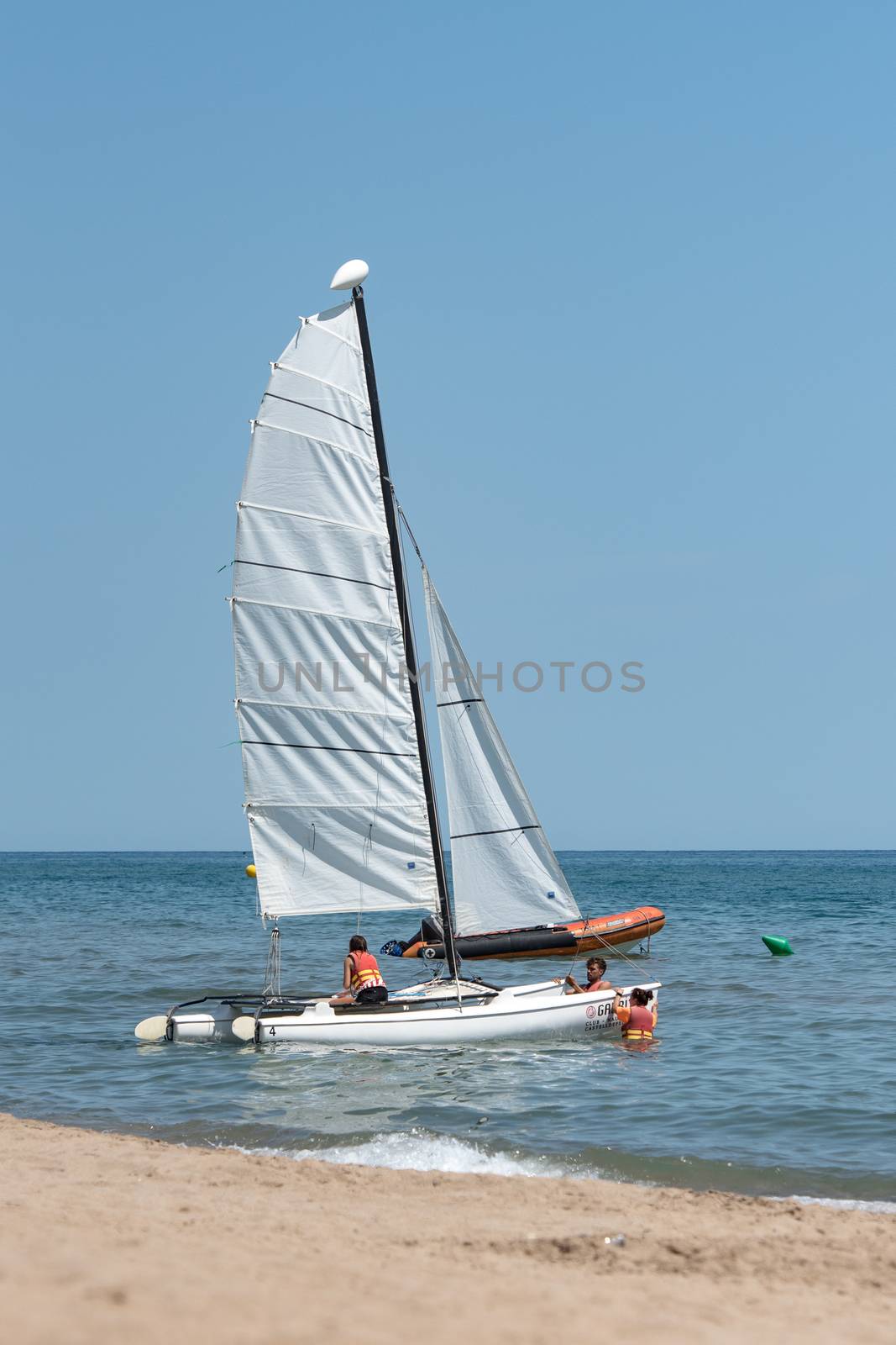 Castelldefels, Spain: 2020 June 25: Boats on the coast of Castelldefels in Barcelona in summer after COVID 19 on June 2020.