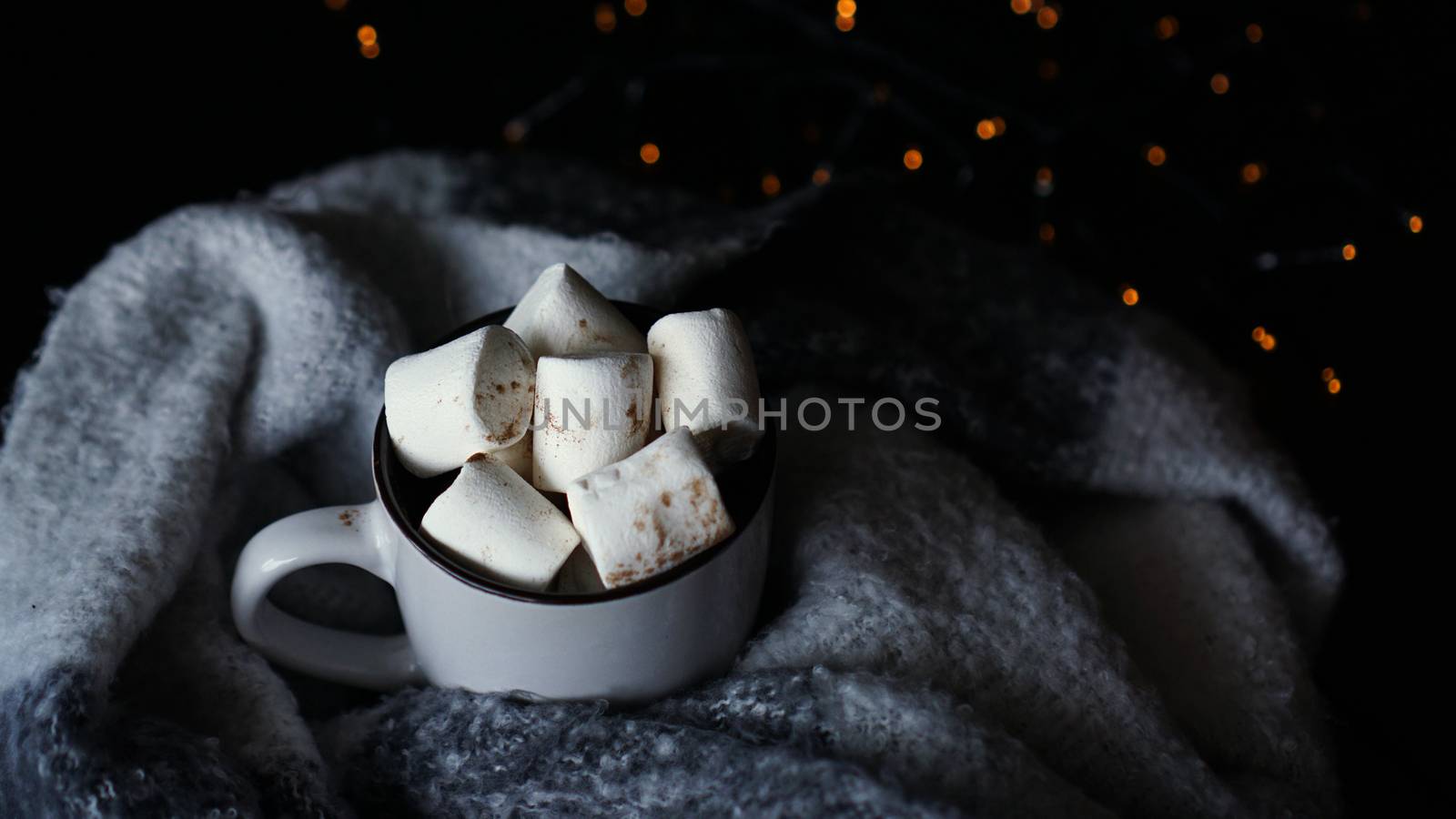 Hot cocoa with marshmallow in a white ceramic mug by natali_brill