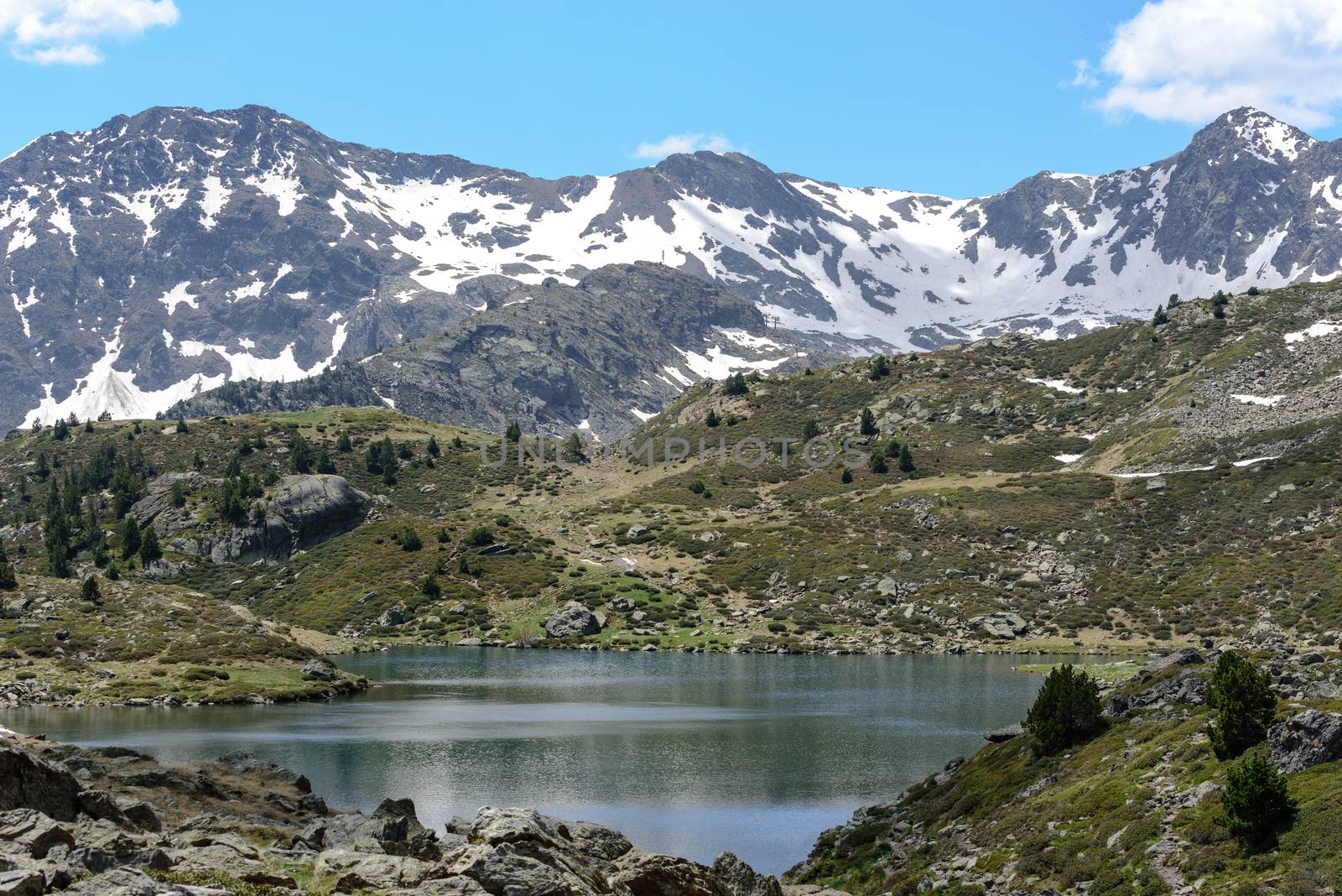 Beautiful view hiking in the Andorra Pyrenees Mountains in Ordino, near the Lakes of Tristaina.