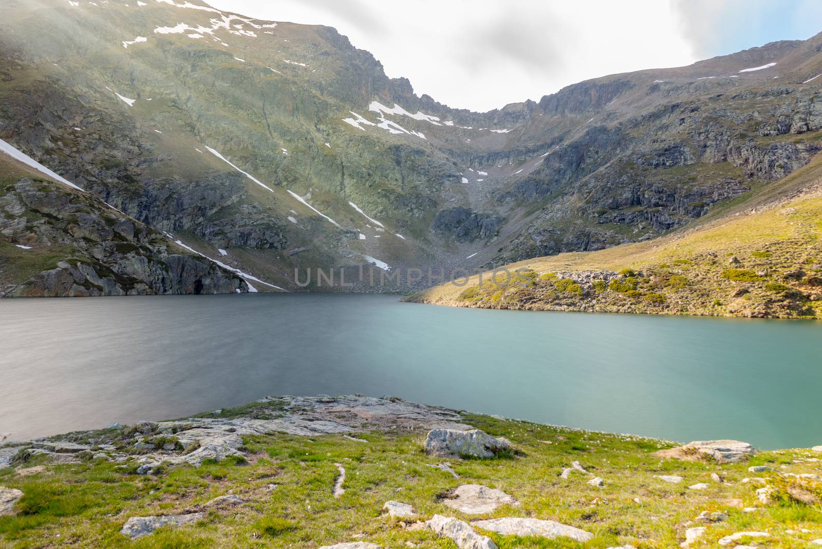 Beautiful Querol Lake in the mountain refuge in the Incles Valley, Canillo, Andorra.