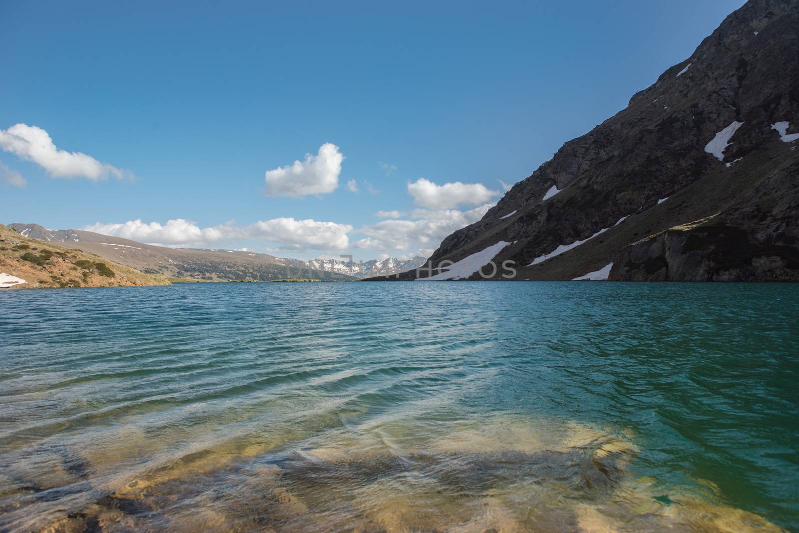 Beautiful Querol Lake in the mountain refuge in the Incles Valley, Canillo, Andorra.