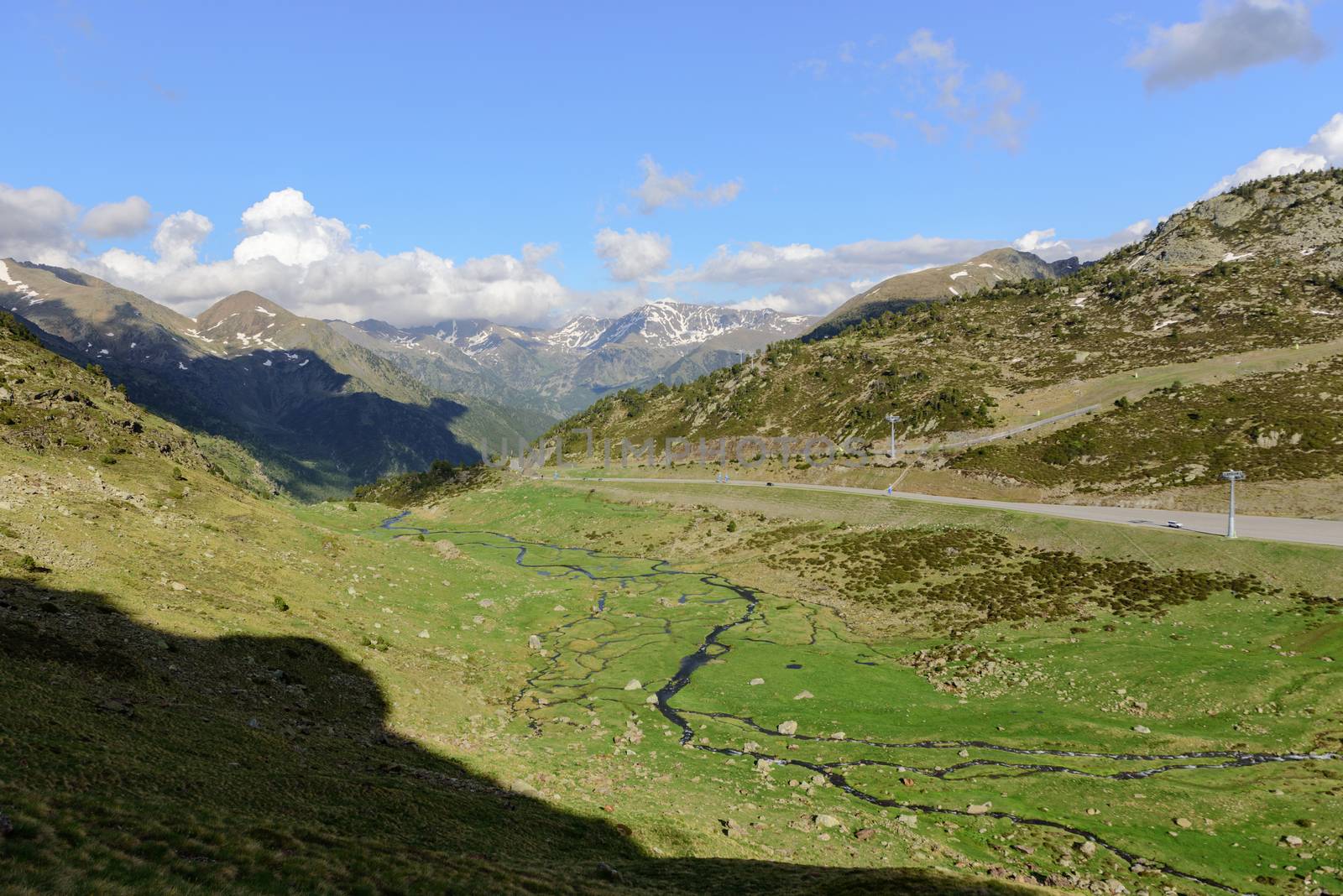 Beautiful view hiking in the Andorra Pyrenees Mountains in Ordino, near the Lakes of Tristaina.