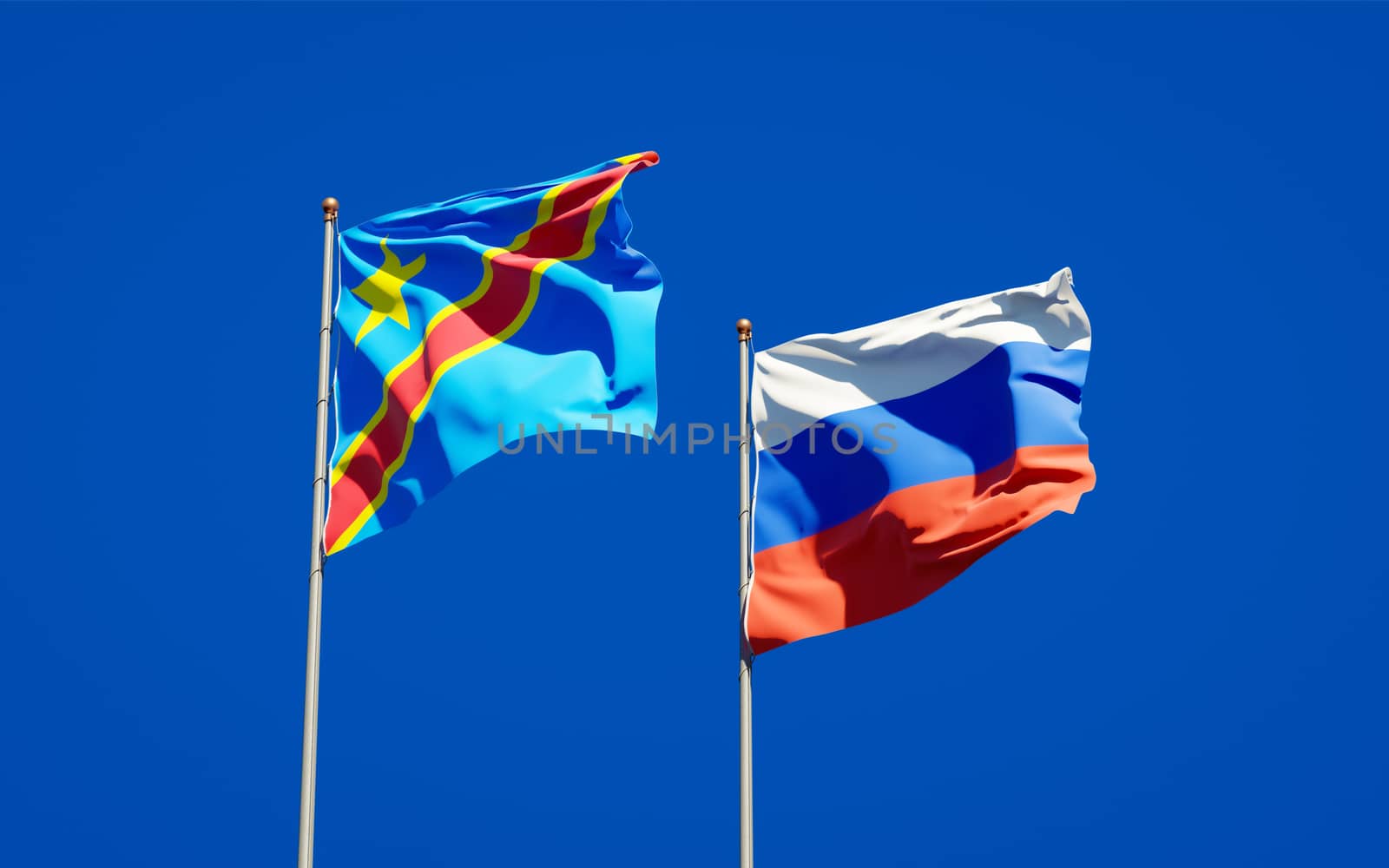 Beautiful national state flags of Russia and Congo together at the sky background. 3D artwork concept. 
