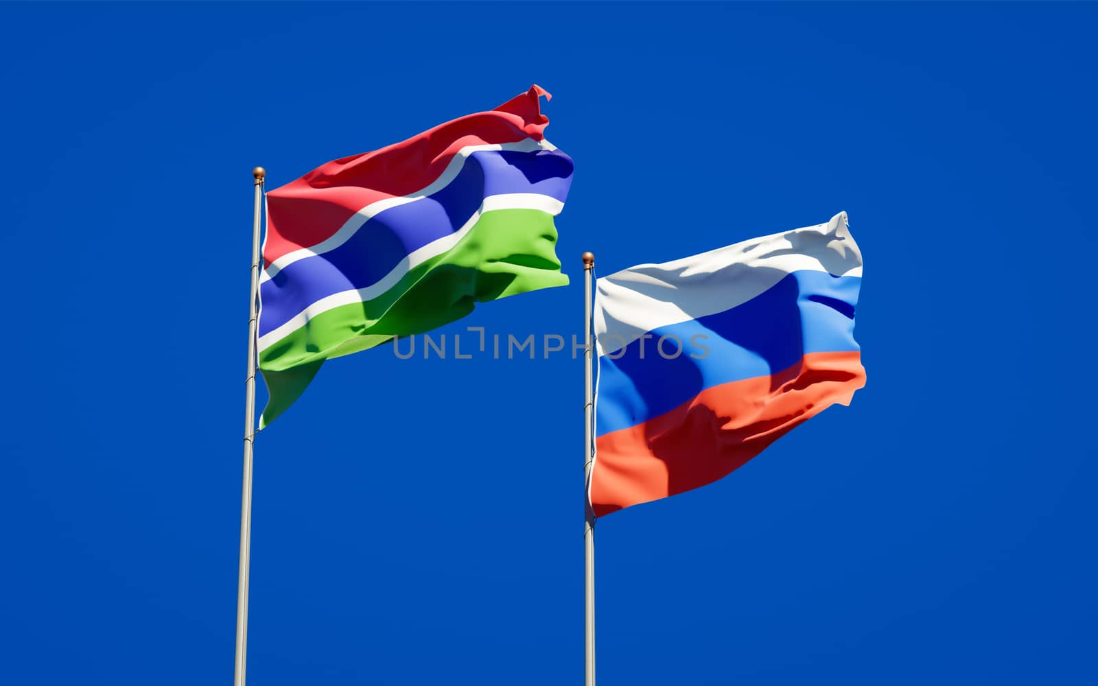 Beautiful national state flags of Gambia and Russia together at the sky background. 3D artwork concept. 