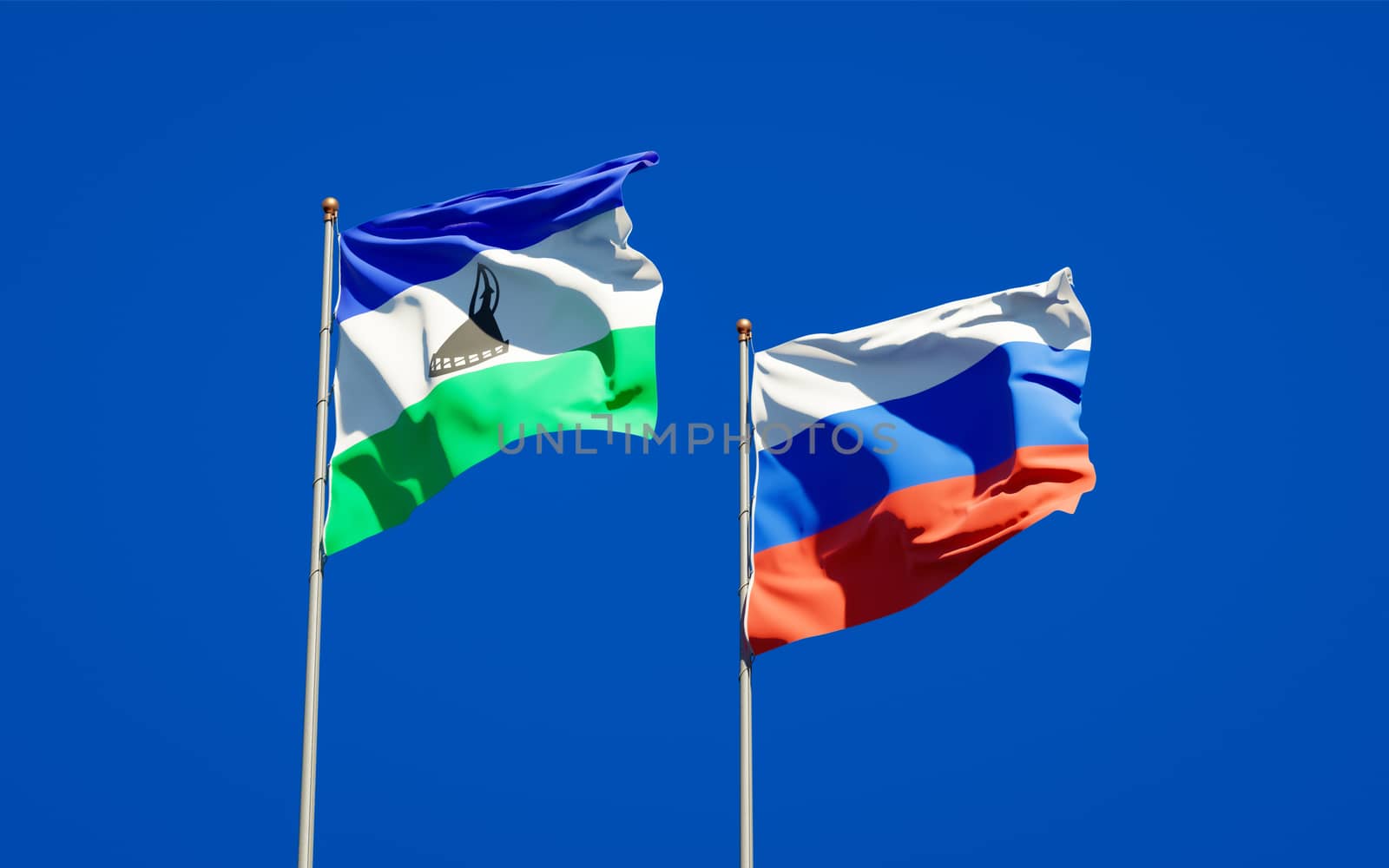 Beautiful national state flags of Lesotho and Russia together at the sky background. 3D artwork concept. 