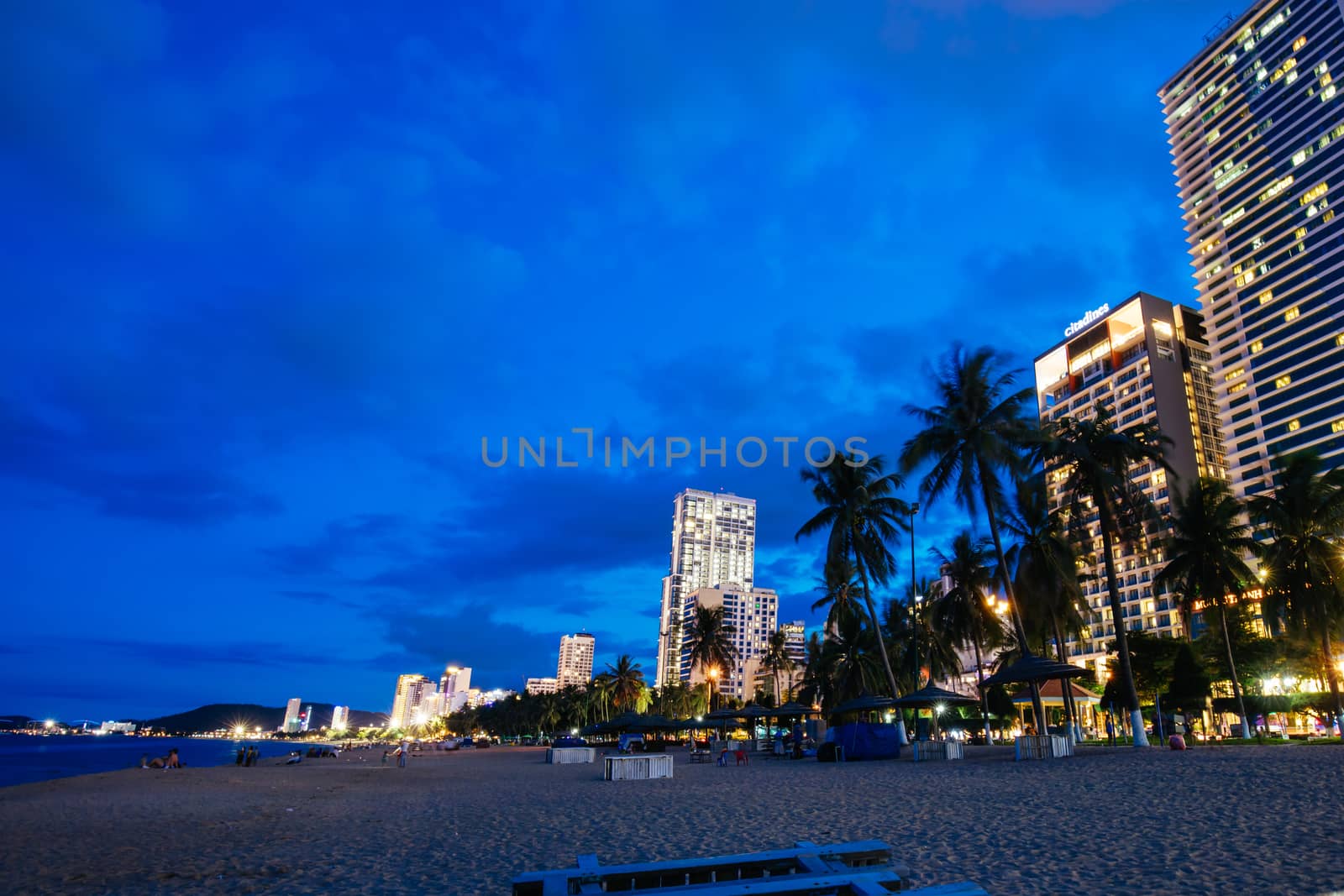 Nha Trang, Vietnam - September 25, 2018: The promenade and main beach of Nha Trang on a warm September evening as the sun sets