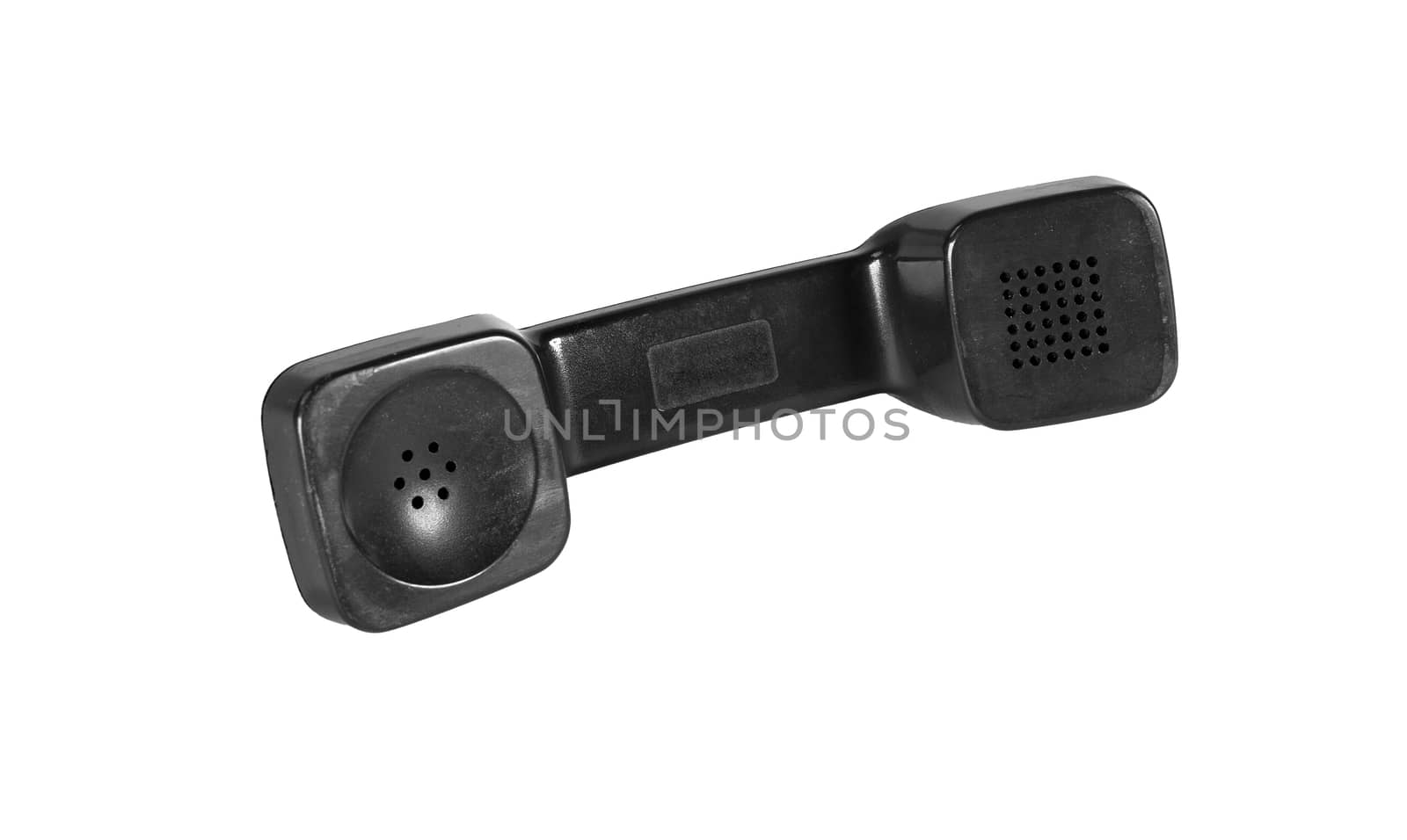 Old handset without telephone wire of black color isolated on a white background.