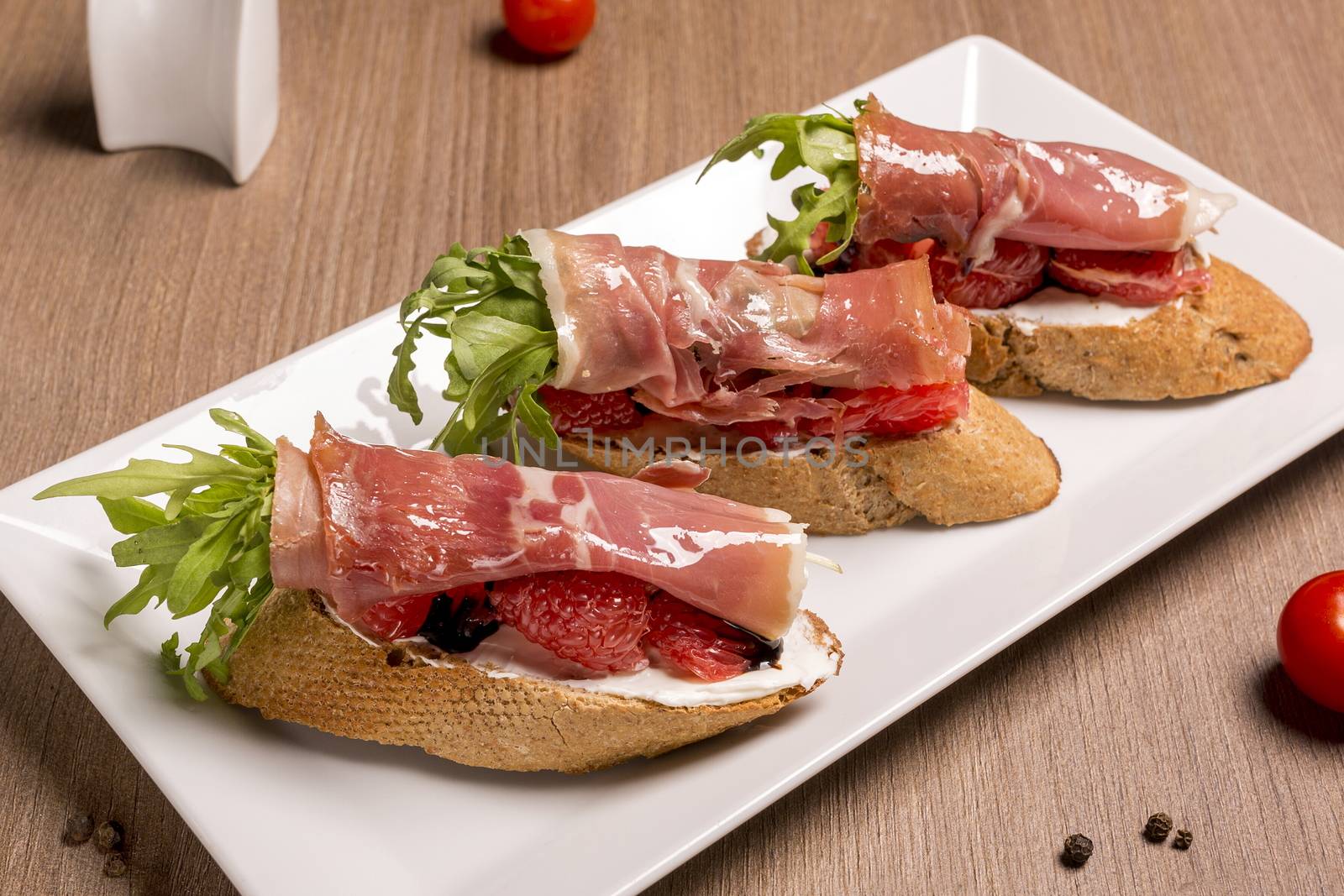 Bruschettes with jamon and grapefruit dried rye baguette by 977_ReX_977