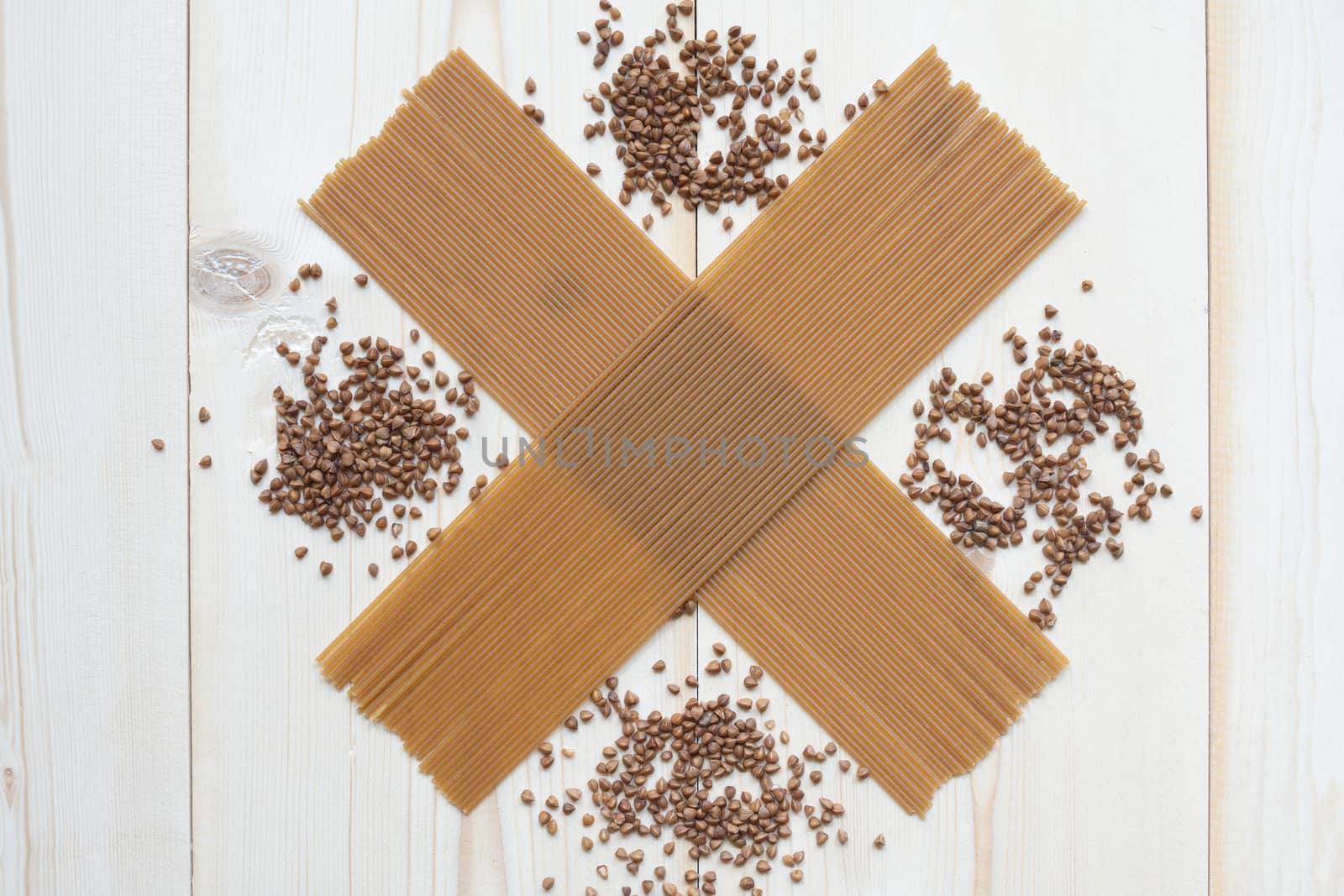 spaghetti made from buckwheat on a wooden table.