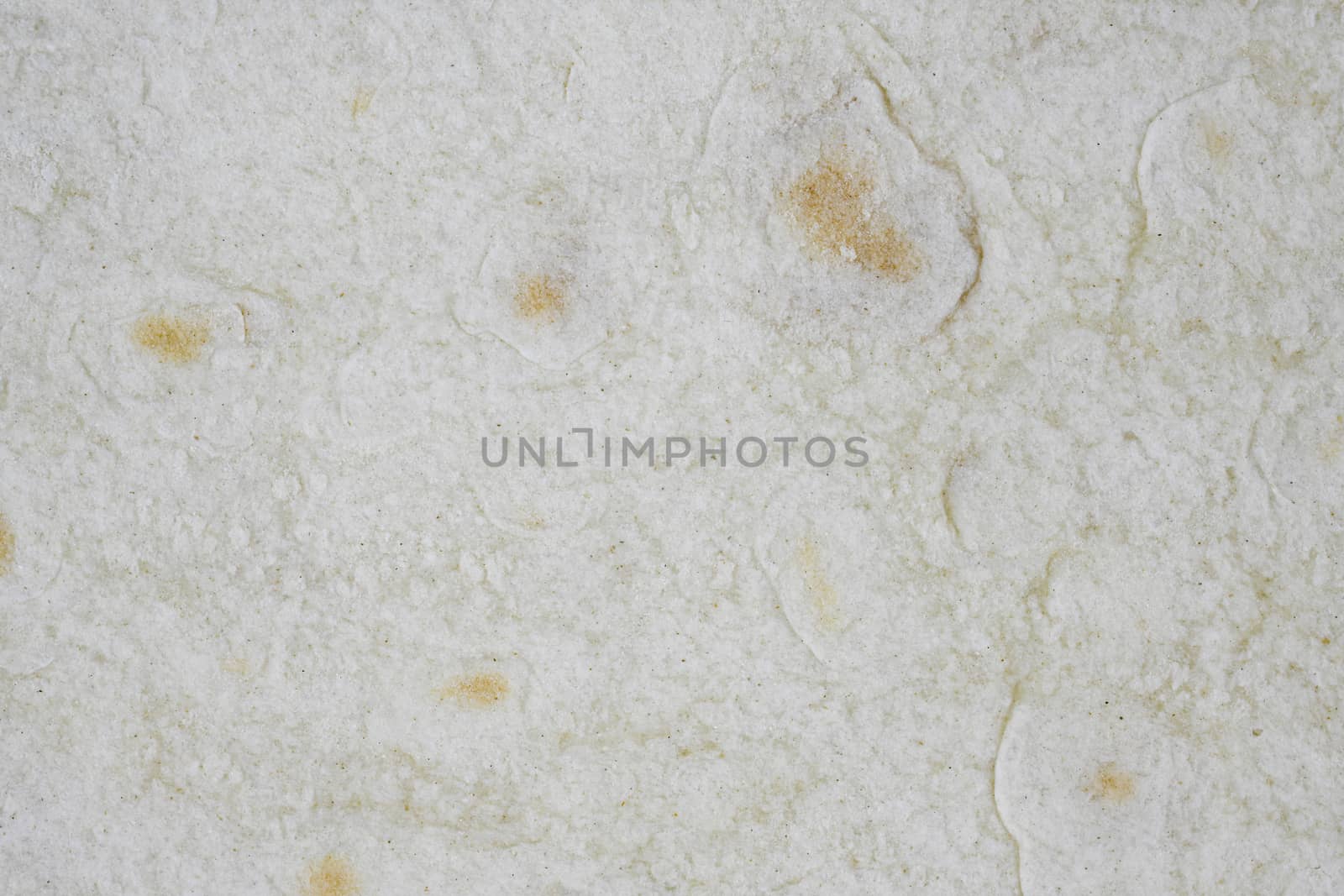 Texture of thin traditional freshly baked homemade oriental bread. Close-up Armenian pita bread - lavash as a textured bread background