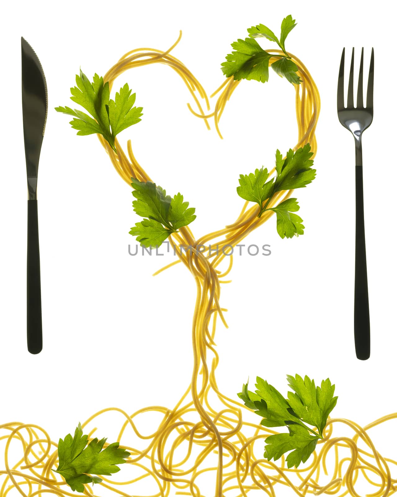 Swirls of cooked spaghetti with fork. Spaghetti heart shape. by sashokddt