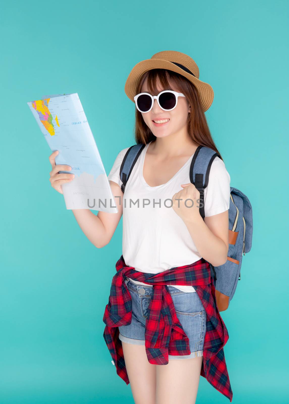 Beautiful happy young asian woman travel looking and success a p by nnudoo