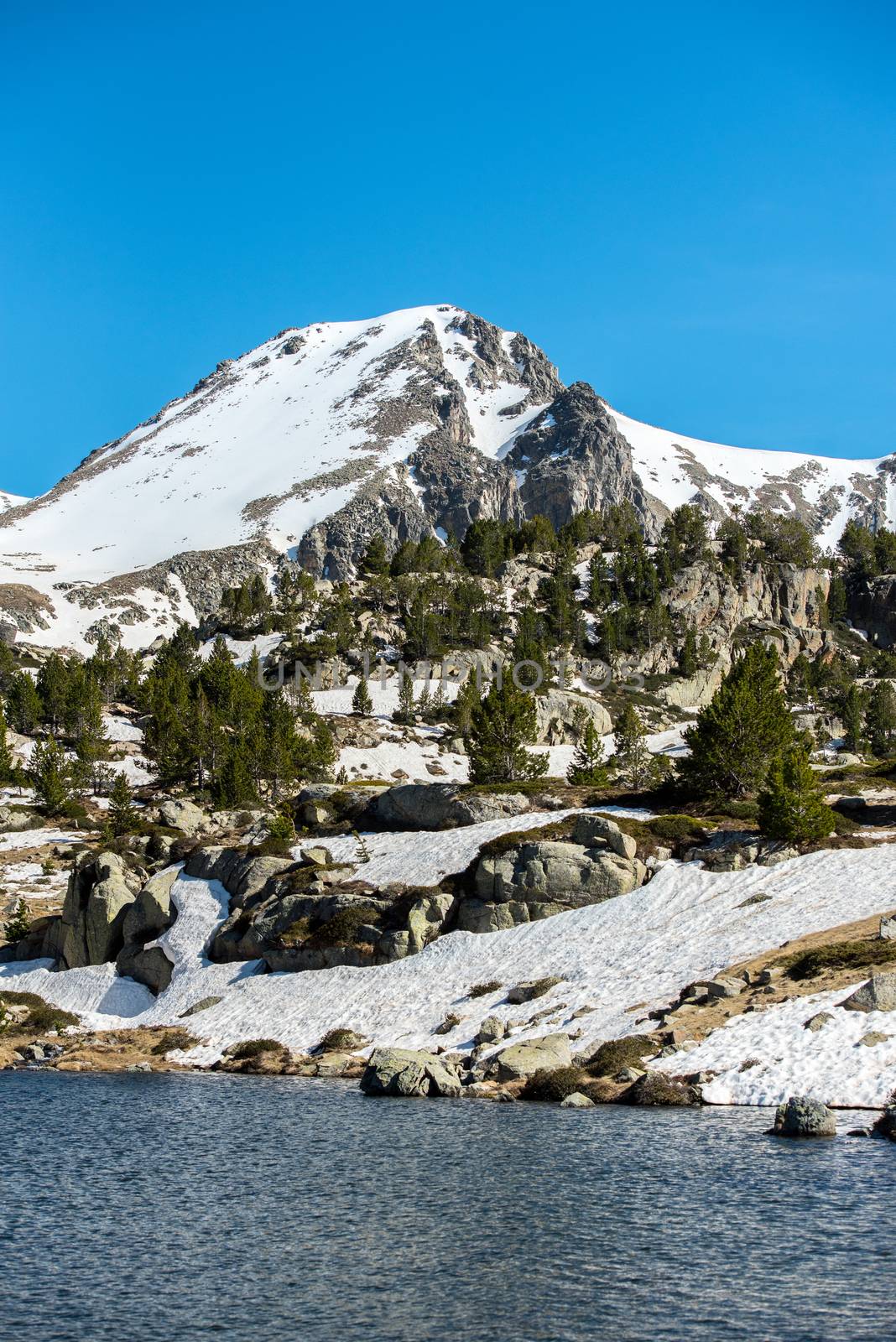 Lake in the circuit of Lake Pessons Grau Roig, Andorra. by martinscphoto