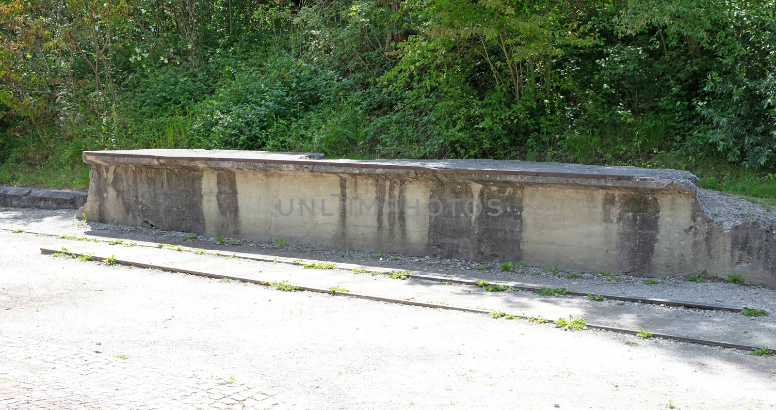 Dachau, Germany - July 13, 2020: Railroad at the entrance of Dac by michaklootwijk