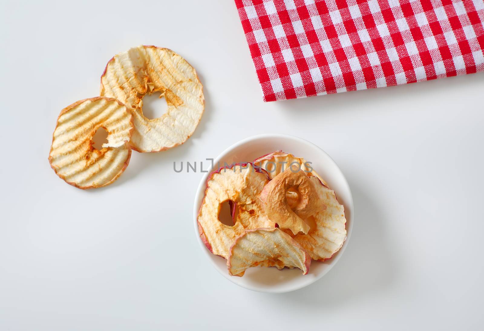 Bowl of dried apple slices - apple chips or rings